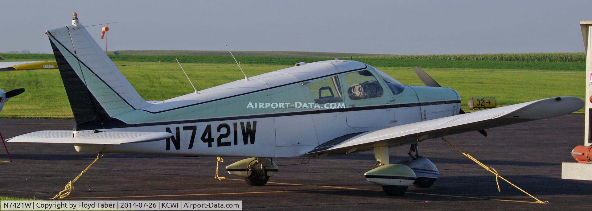 N7421W, 1963 Piper PA-28-180 C/N 28-1309, Sitting tied down at the Clinton Airport