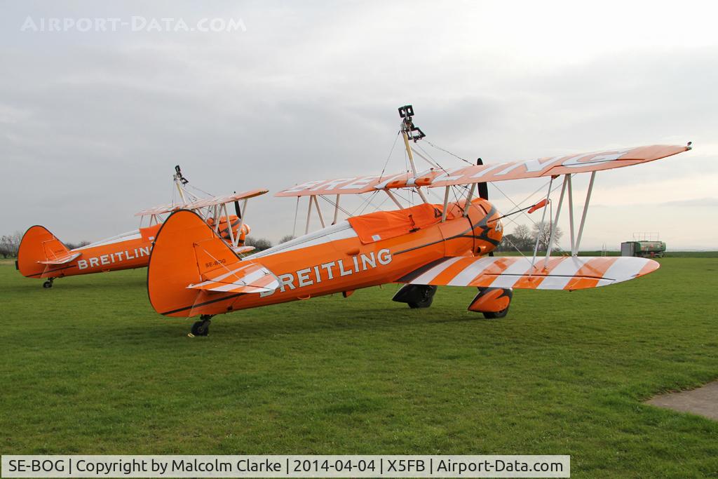 SE-BOG, 1942 Boeing N2S-3 Kaydet (B75N1) C/N 75-7128, The Breitling Teams Boeing B-75N-1 SE-BOG with sister aircraft N74189, overnighting at Fishburn prior to a first UK performance in 2014 at Littlehaven's Promenade & Seawall opening celebrations, South Shields. April 5th 2014.