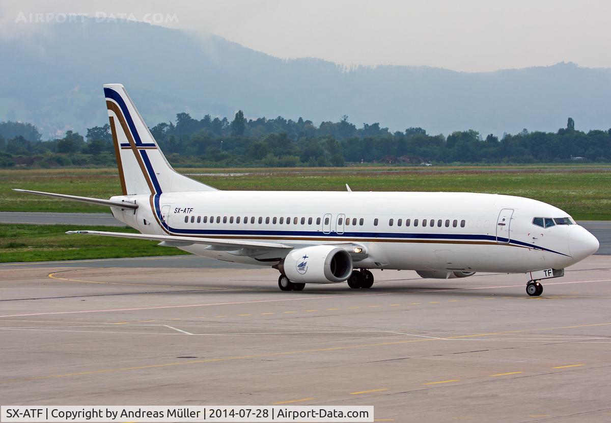 SX-ATF, 1992 Boeing 737-406 C/N 25423, Arrived from London Luton with Arsenal on board.
