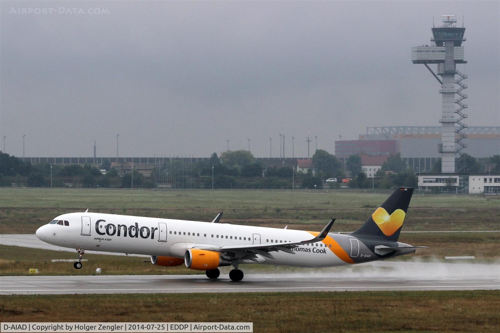 D-AIAD, 2014 Airbus A321-211 C/N 6053, Leaving rainy LEJ on rwy 08L....