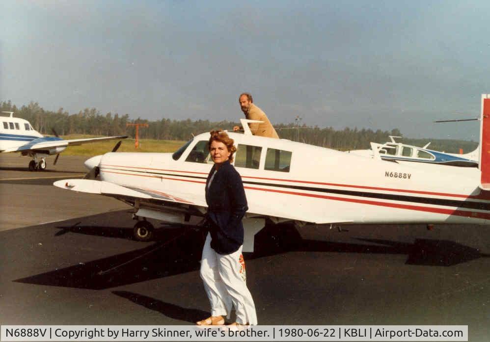 N6888V, 1975 Mooney M20F Executive C/N 22-1275, This is a photo of my wife, Sally, and me climbing into N6888V.  I bought the aircraft new from the factory delivered to Chicago fully equipped in 1975 for $45,000.  Few it all over U.S. and Bahamas until we moved to TYO in '83. Sold it for $18000.