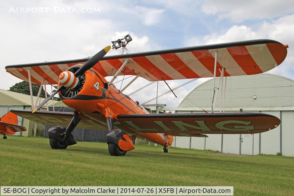 SE-BOG, 1942 Boeing N2S-3 Kaydet (B75N1) C/N 75-7128, Boeing B75N-1 Stearman prior to a wing walking performance at the 2014 Sunderland Air Show. Fishburn Airfield, July 2014.
