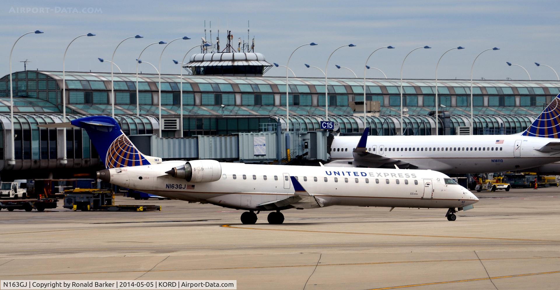 N163GJ, 2006 Bombardier CRJ-702 (CL-600-2C10) Regional Jet C/N 10255, Taxi for takeoff O'Hare