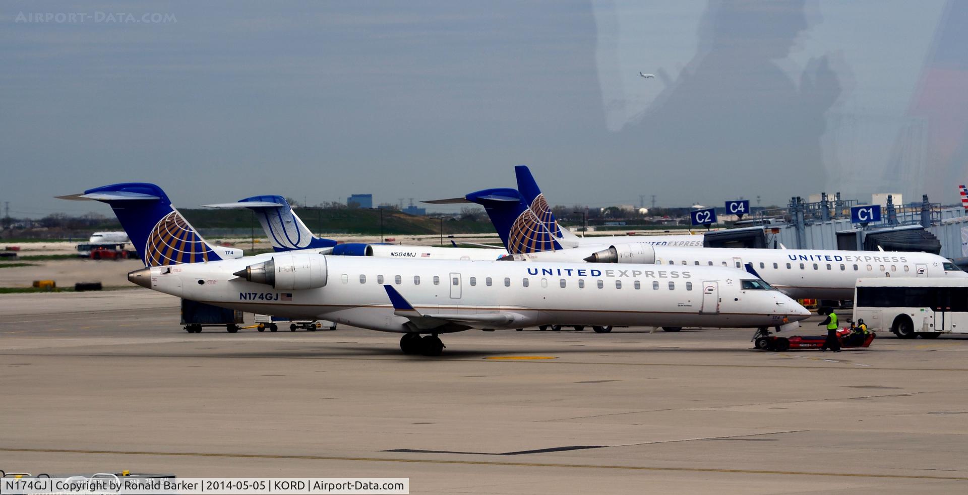 N174GJ, Bombardier CRJ-701ER (CL-600-2C10) Regional Jet C/N 10296, Pushback O'Hare