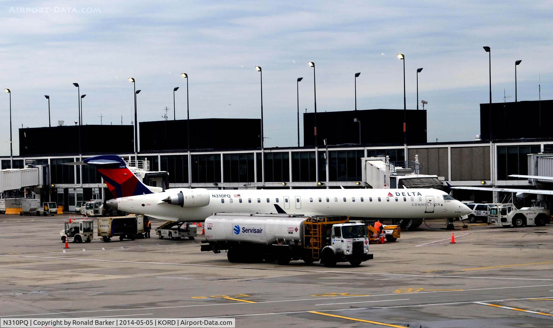 N310PQ, 2014 Bombardier CRJ-900 NG (CL-600-2D24) C/N 15310, At the gate O'Hare