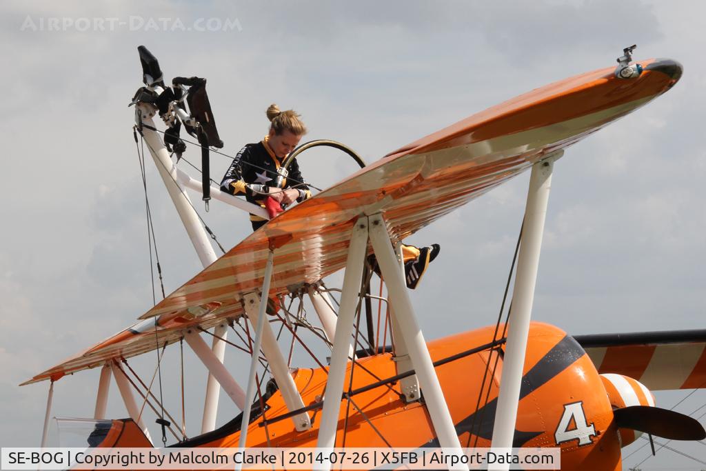SE-BOG, 1942 Boeing N2S-3 Kaydet (B75N1) C/N 75-7128, Boeing B75N-1 Stearman topping up the fuel prior to a wing walking performance at the 2014 Sunderland Air Show. Fishburn Airfield, July 2014.