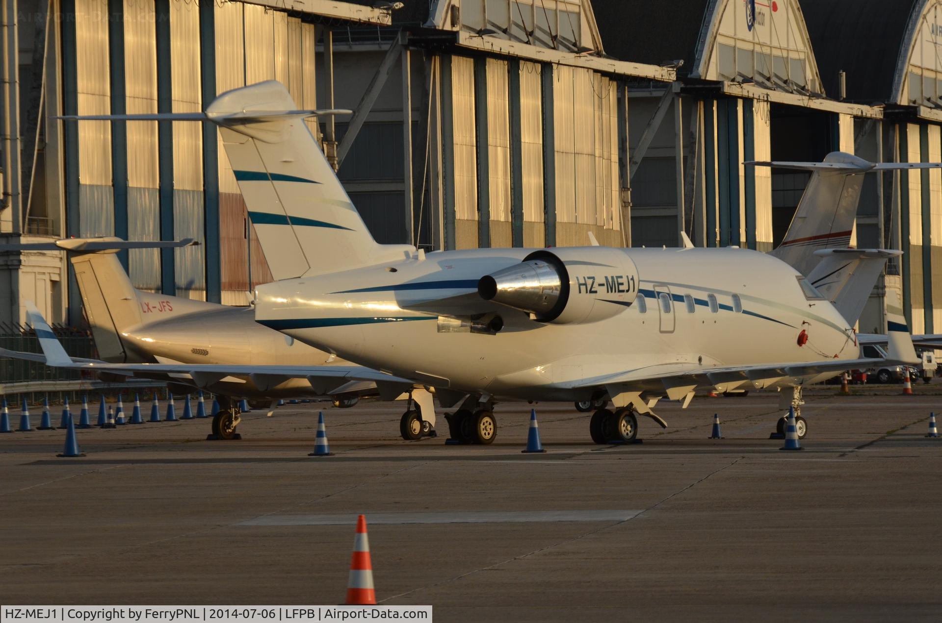 HZ-MEJ1, 2002 Raytheon B200 King Air C/N BB-1801, Saudi CL604 on the ramp at LBG