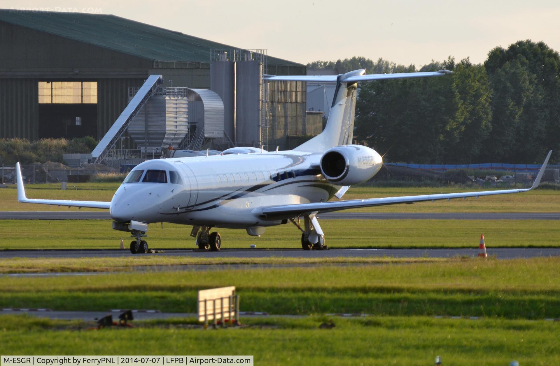 M-ESGR, 2007 Embraer ERJ-135BJ Legacy 600 C/N 14501016, EMB135BJ Legacy 600 in front of the Embrear hangar in LBG