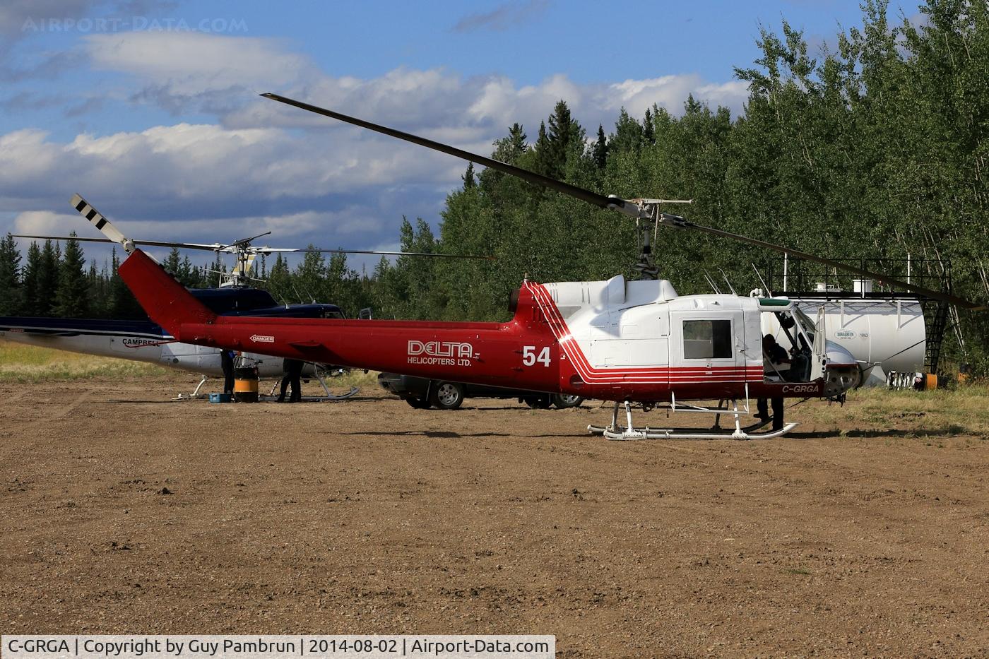 C-GRGA, 1965 Bell 204B C/N 2026, On standby for forest fire detail in Zama City, Alberta