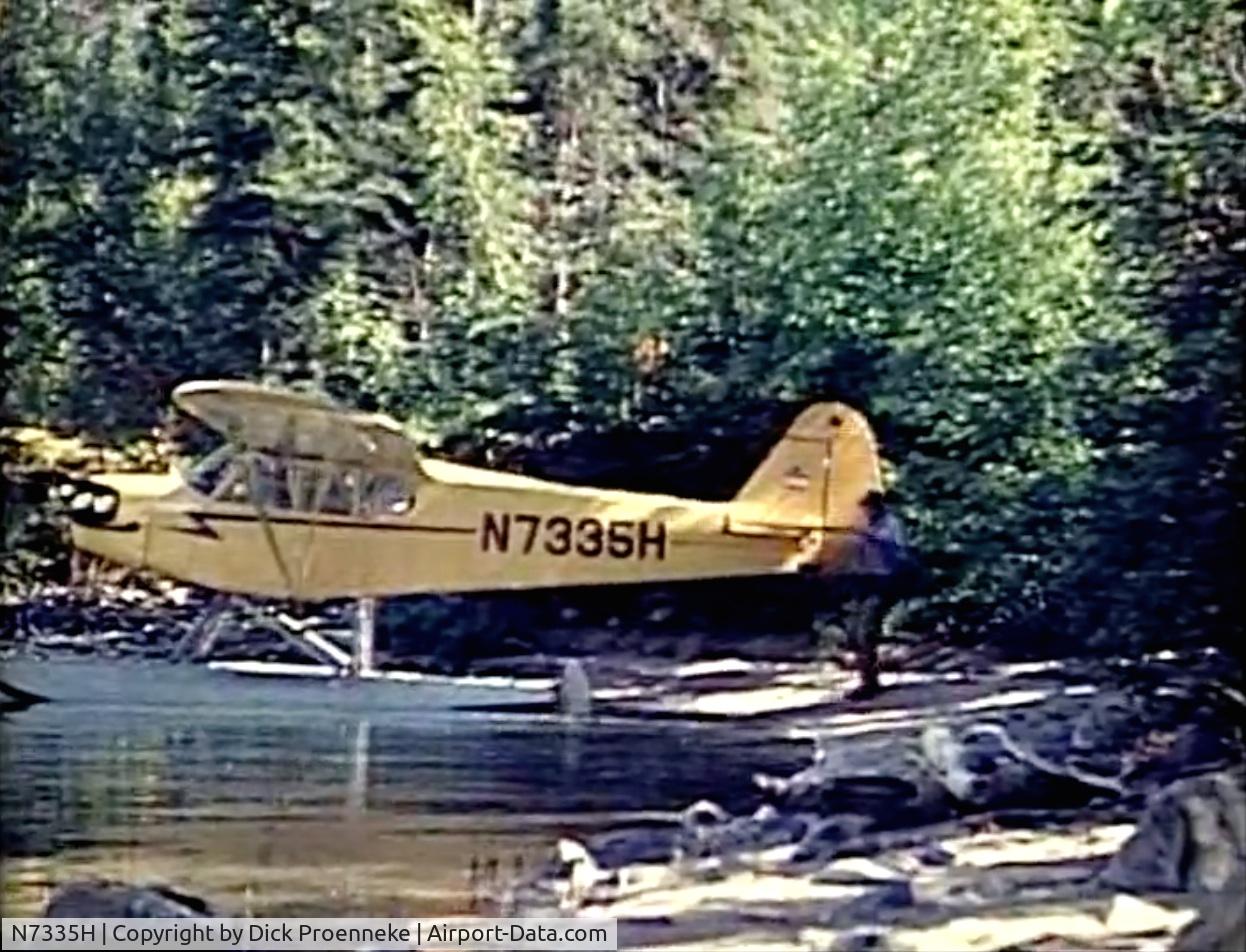 N7335H, 1946 Piper J-3C Cub C/N 20594, Piper Cub owned by Jake Proenneke on Alaskan lake c. 1970