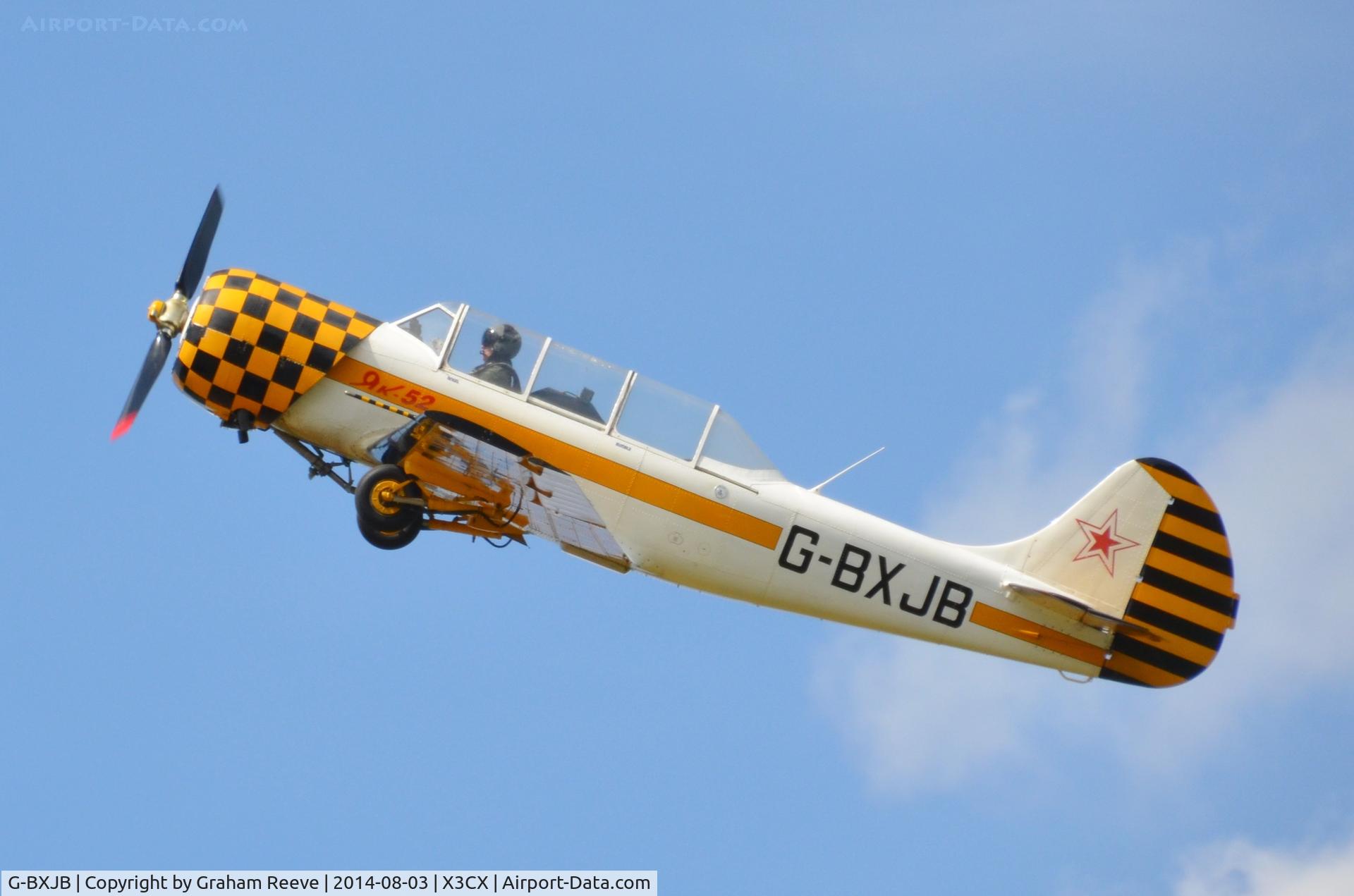 G-BXJB, 1987 Bacau Yak-52 C/N 877403, In the air at Northrepps.