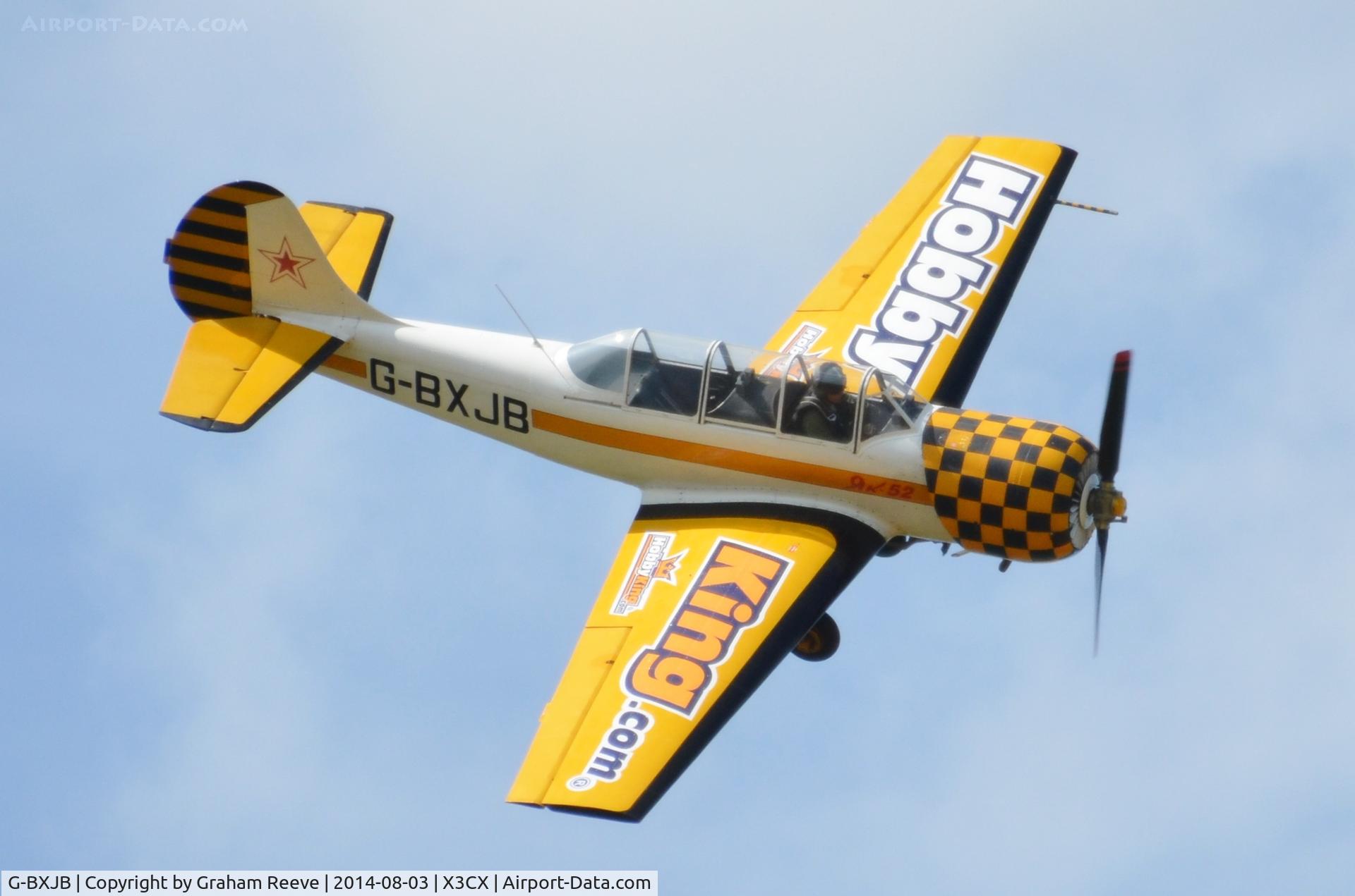 G-BXJB, 1987 Bacau Yak-52 C/N 877403, In the air at Northrepps.