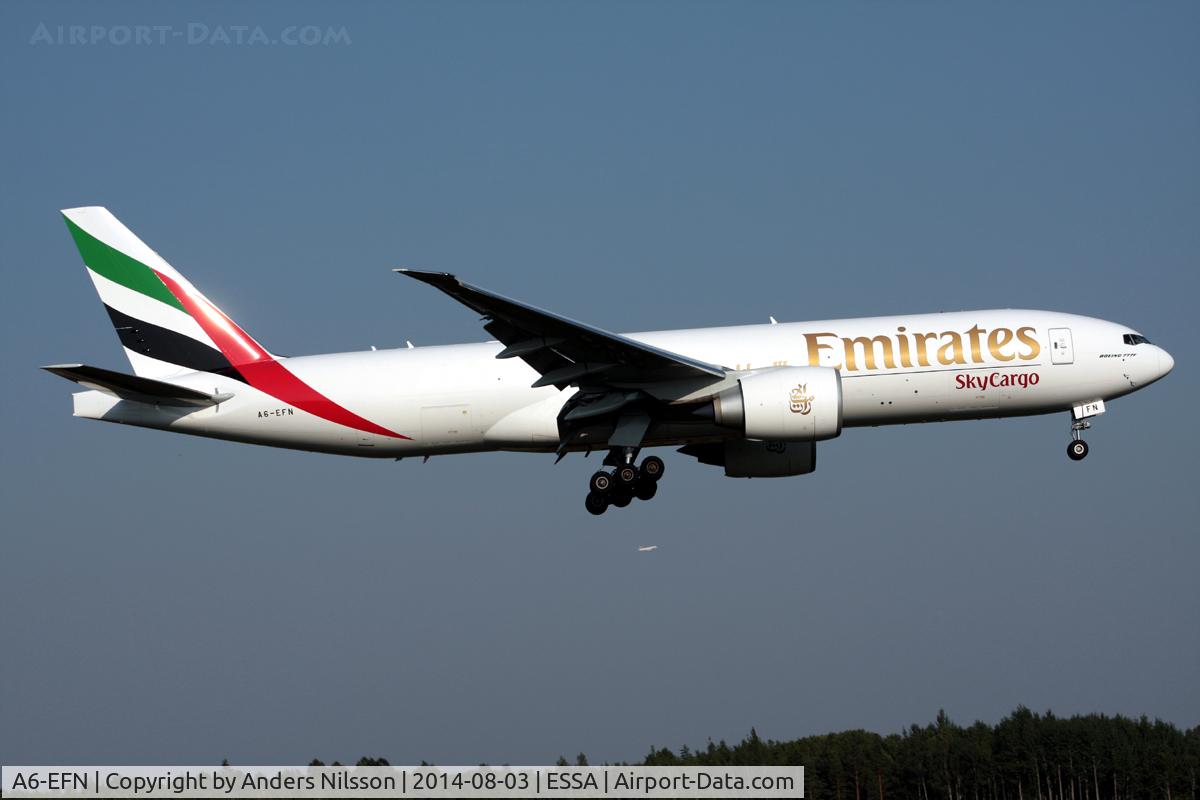 A6-EFN, 2014 Boeing 777-F1H C/N 42232, On final for 19R.