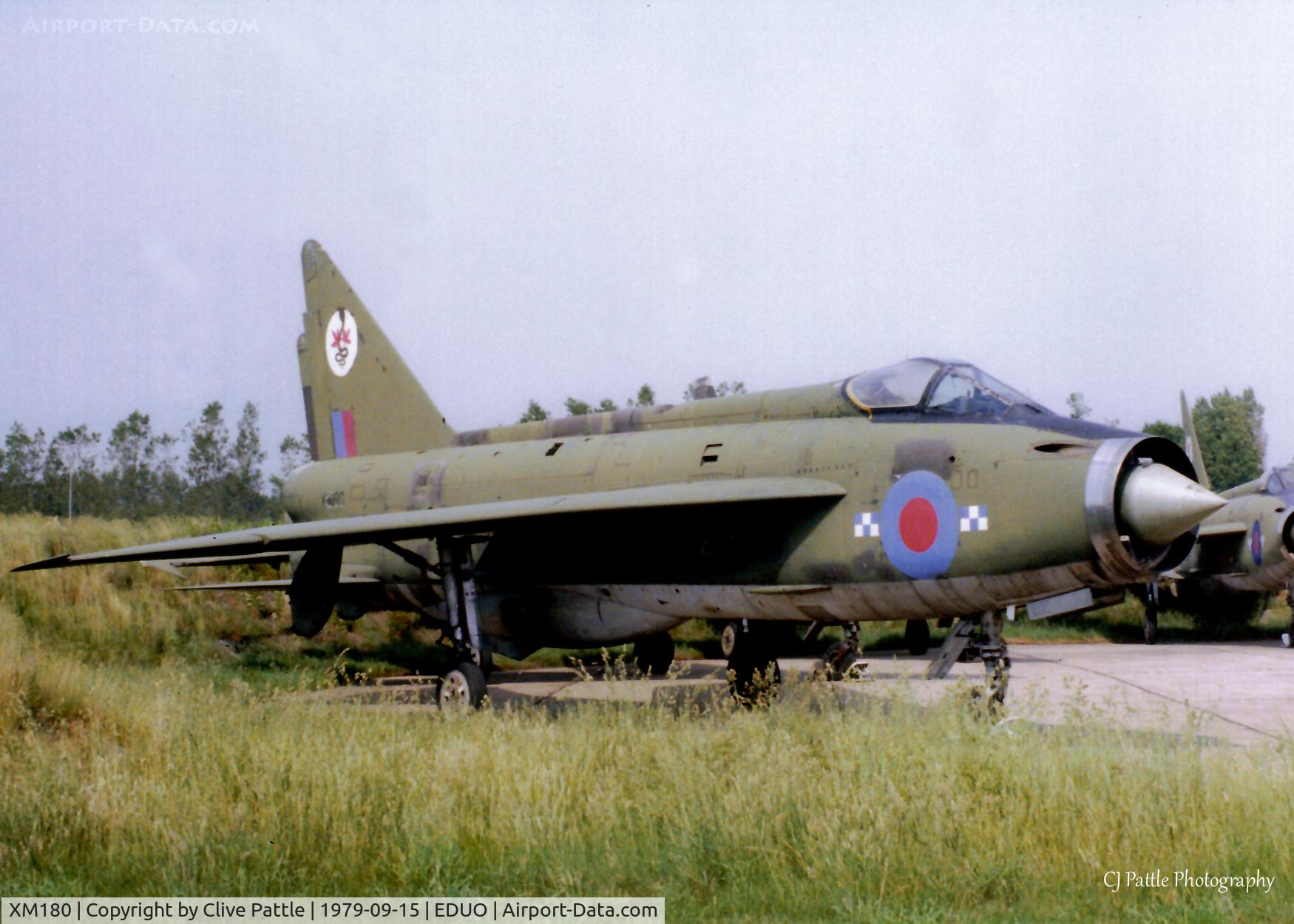 XM180, 1960 English Electric Lightning F.1A C/N 95067, Scanned from a print, Lightning F.1A XM180 on the dump at RAF Gutersloh, (EDUO) in September 1979 having finished decoy duties as 8424M - Still alive in 1982 !