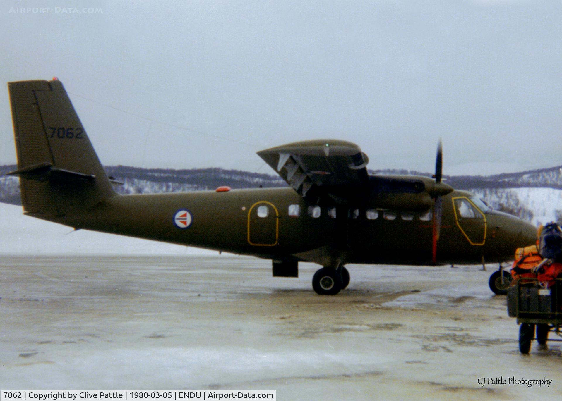 7062, 1967 De Havilland Canada DHC-6-100 Twin Otter C/N 62, Scanned from a print, RNoAF Twin Otter '7062' hard at work on the ramp at Bardufoss (ENDU) March 1980.