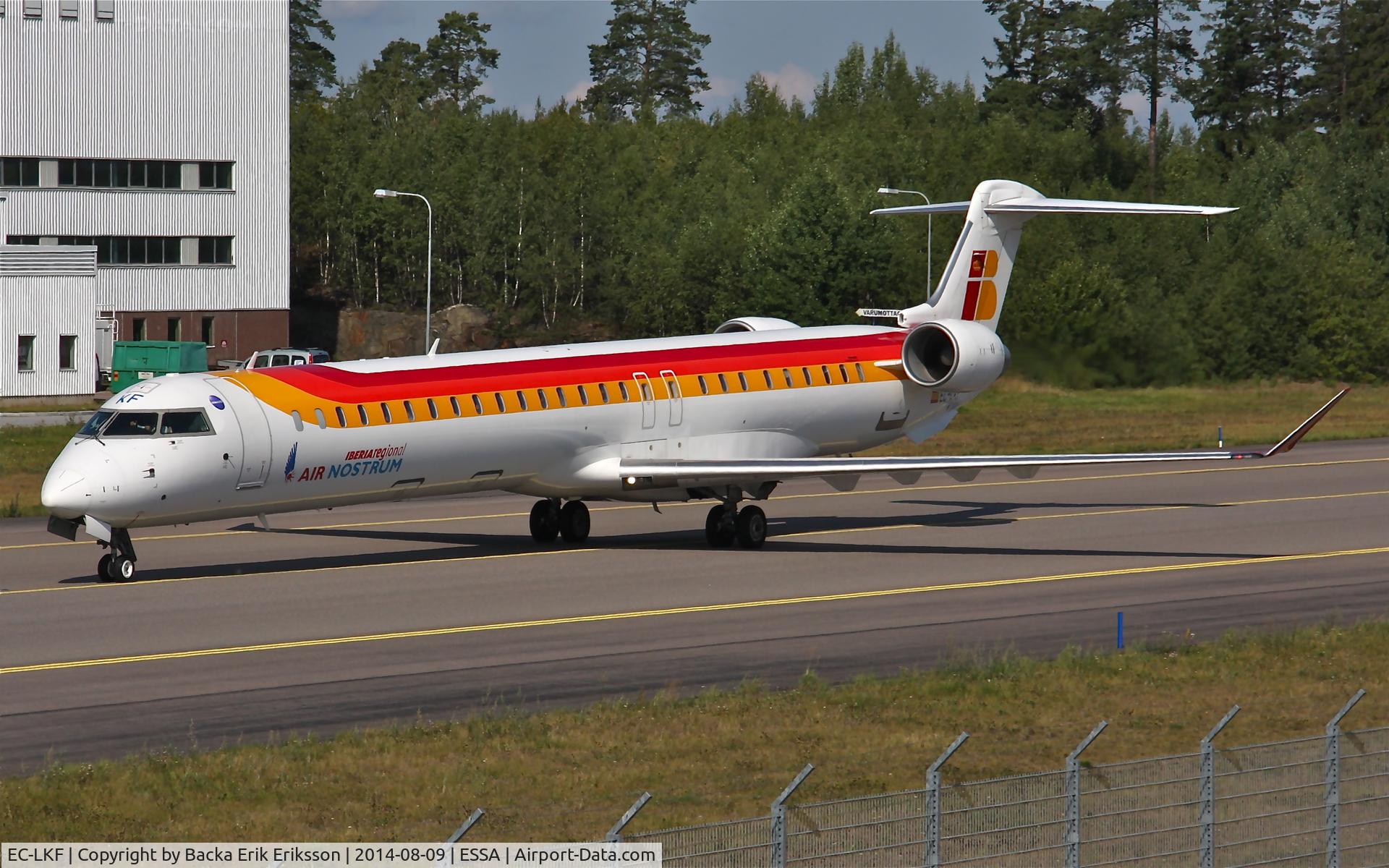 EC-LKF, 2010 Bombardier CRJ-1000ER NG (CL-600-2E25) C/N 19011, Taxiing on taxiway W after towards ramp M after landing on rwy 26.