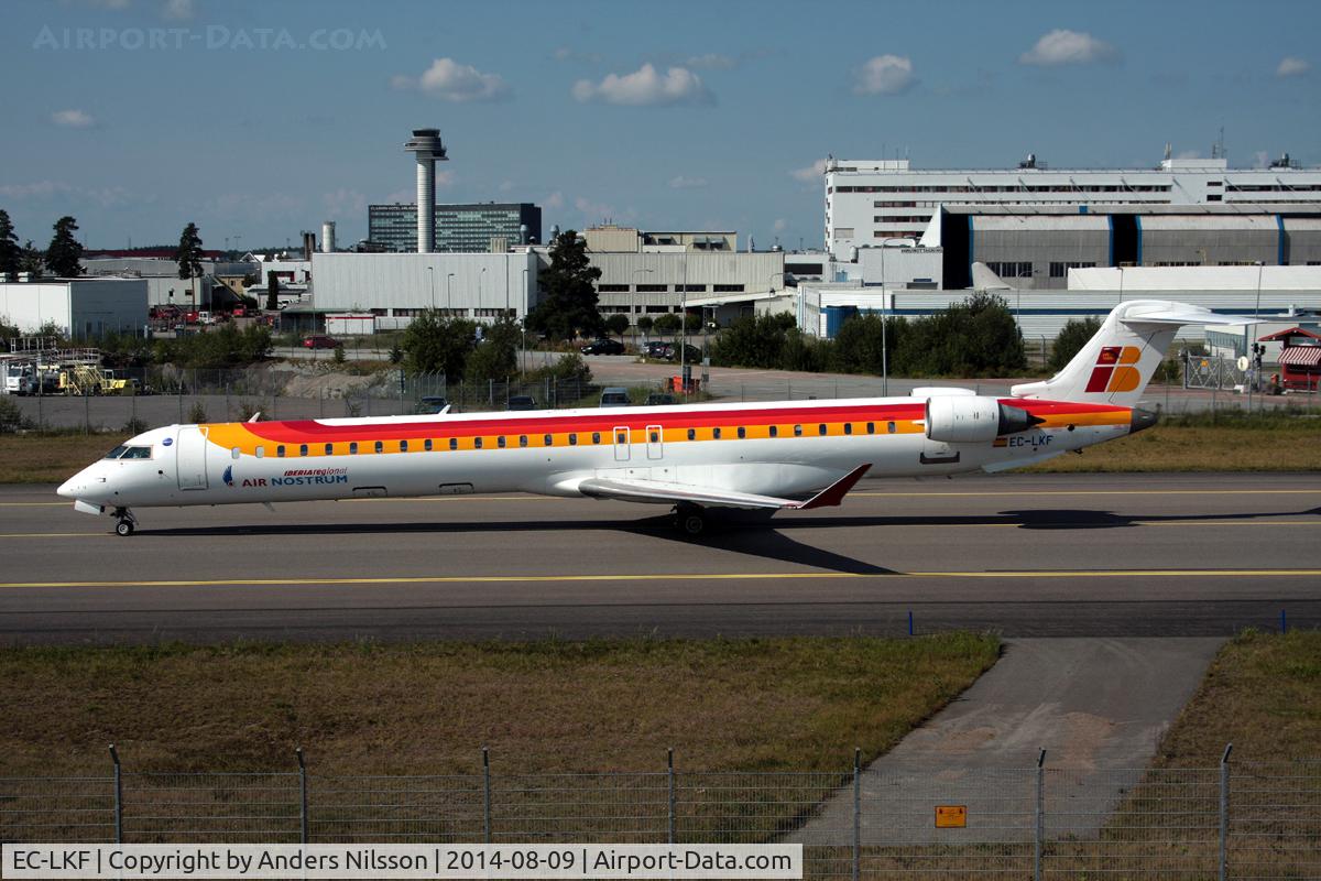 EC-LKF, 2010 Bombardier CRJ-1000ER NG (CL-600-2E25) C/N 19011, Taxiing towards ramp M after a flight from Valencia.