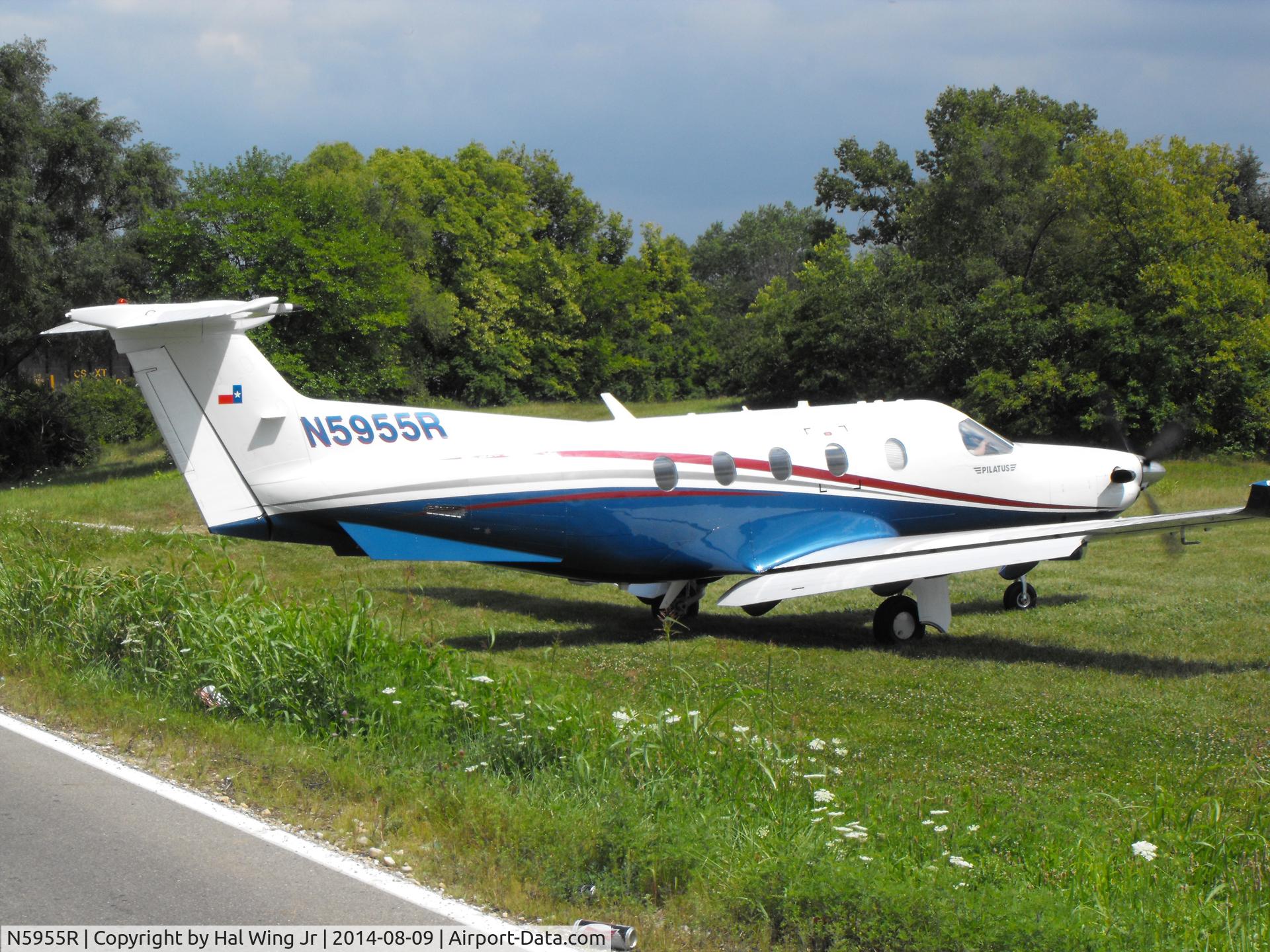 N5955R, 2009 Pilatus PC-12/47E C/N 1178, WACO Field, Troy Ohio a little after 3pm. Strip handles WACO bi-planes, but had had to stop and watch pilot get this out of here