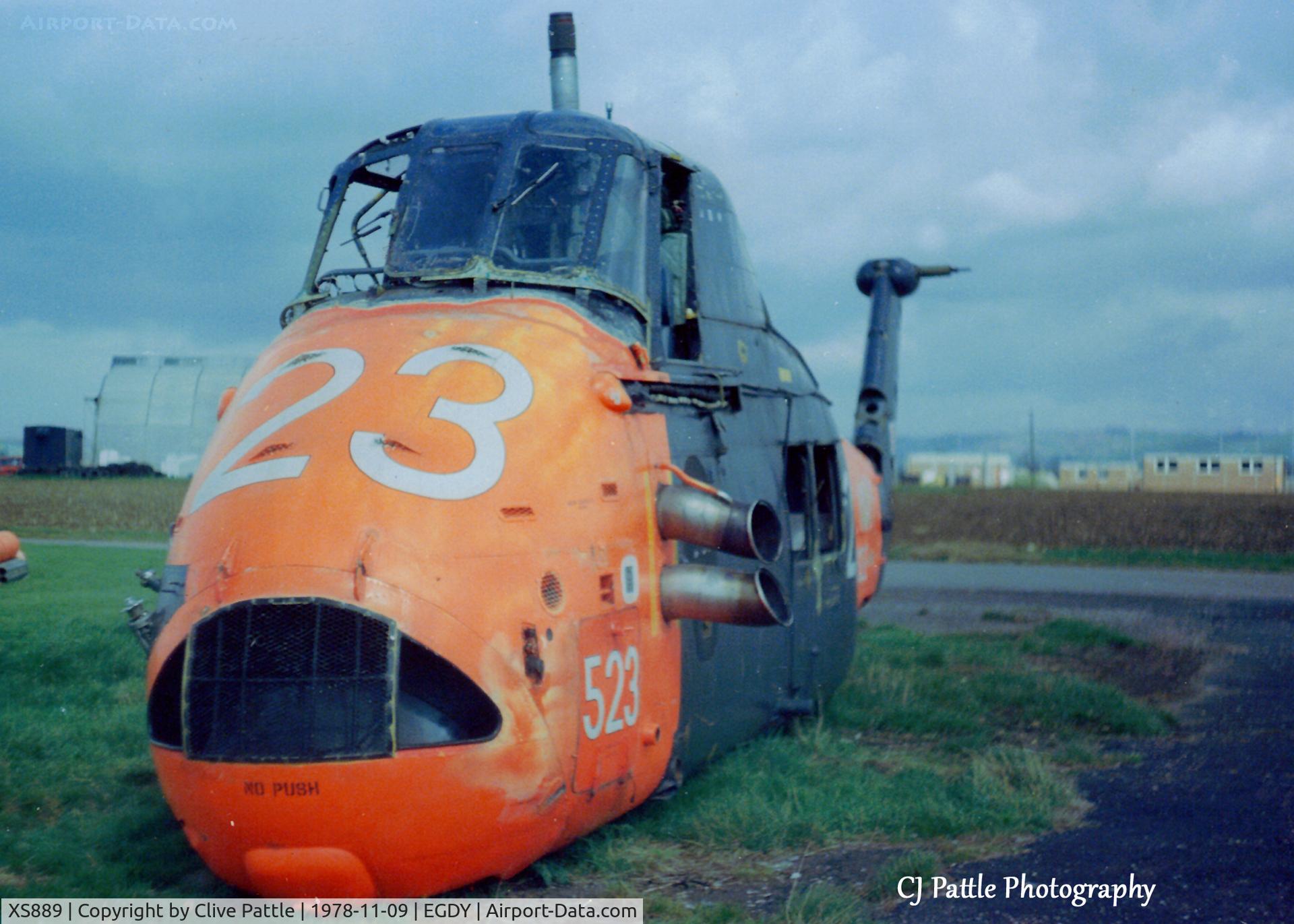 XS889, 1966 Westland Wessex HAS.1 C/N WA269, Scanned from print. Pictured in its last few weeks of existance before death by fire, Wessex HAS.1 XS889 on the dump/fire training area at RNAS Yeovilton EGDY.