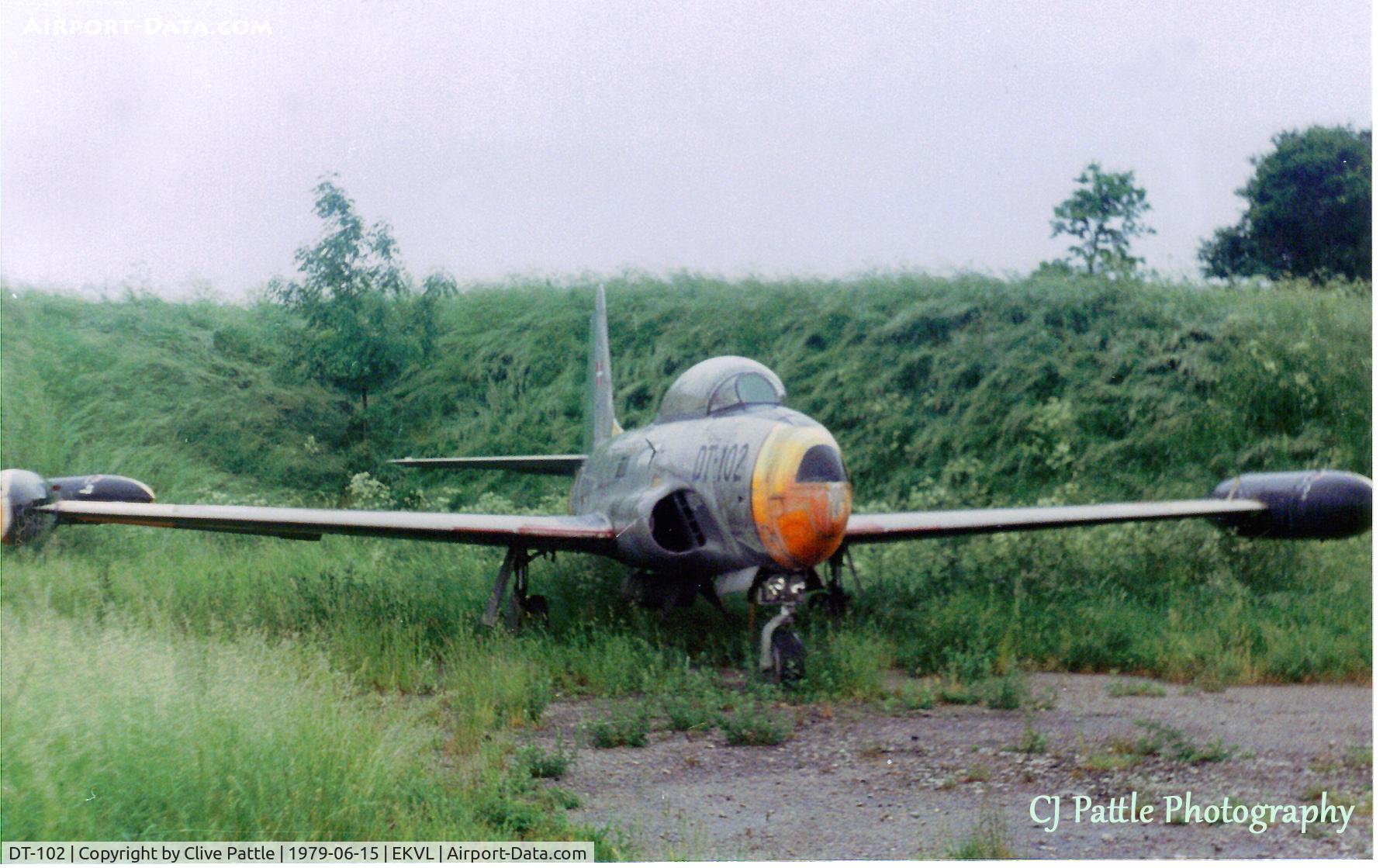 DT-102, 1951 Lockheed T-33A Shooting Star C/N 580-6886, Scanned from print. T-33A DT-102 in external storage at Vaerlose, Denmark (EKVL), June 1979