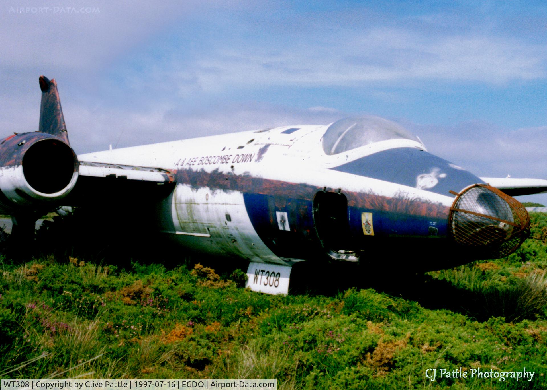 WT308, English Electric Canberra B(I).6 C/N EEP71430, Scanned from print. Canberra WT308 pictured within the fire training area at Predannack, Cornwall July '97
