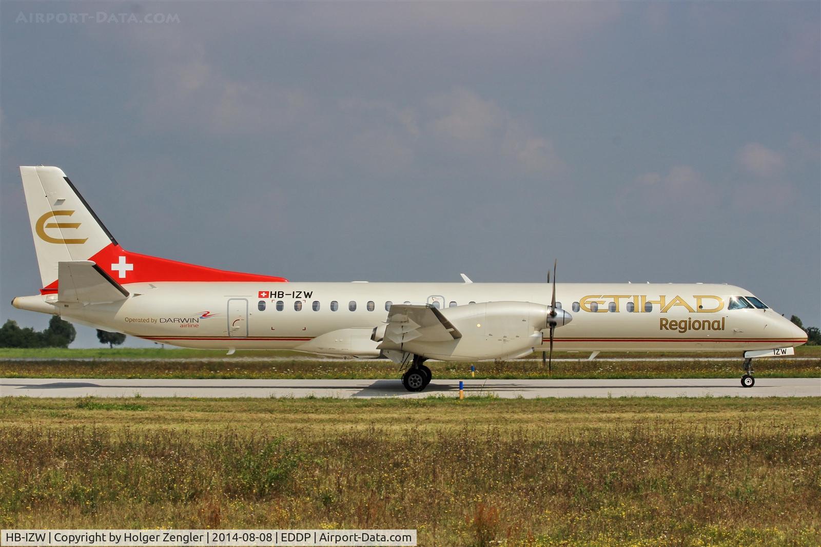HB-IZW, 1996 Saab 2000 C/N 2000-039, Beautiful livery is presented on sunny twy Alpha.....