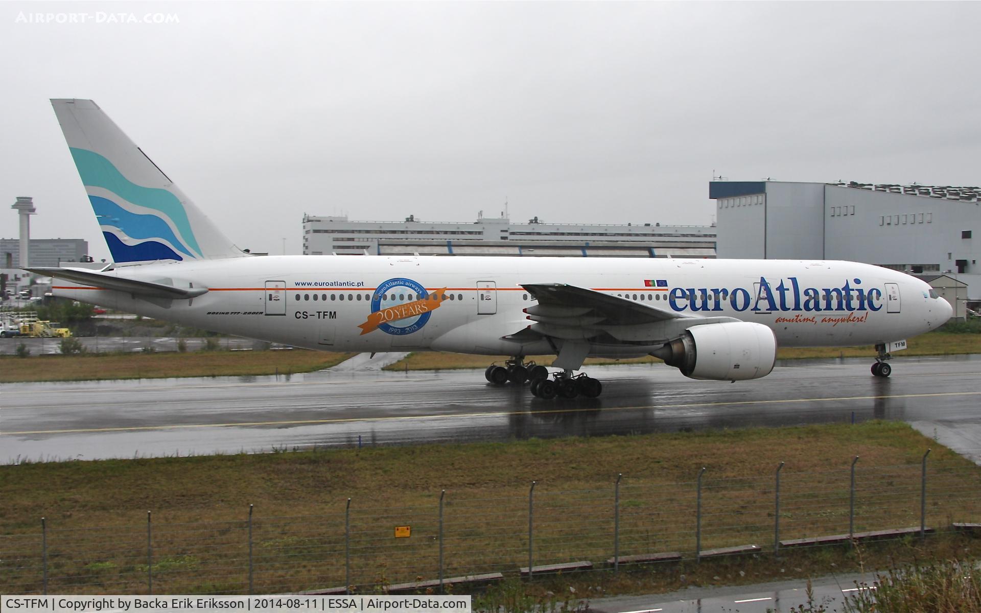 CS-TFM, 1998 Boeing 777-212/ER C/N 28513, Taxiing on taxiway W after landing on rwy 19L.