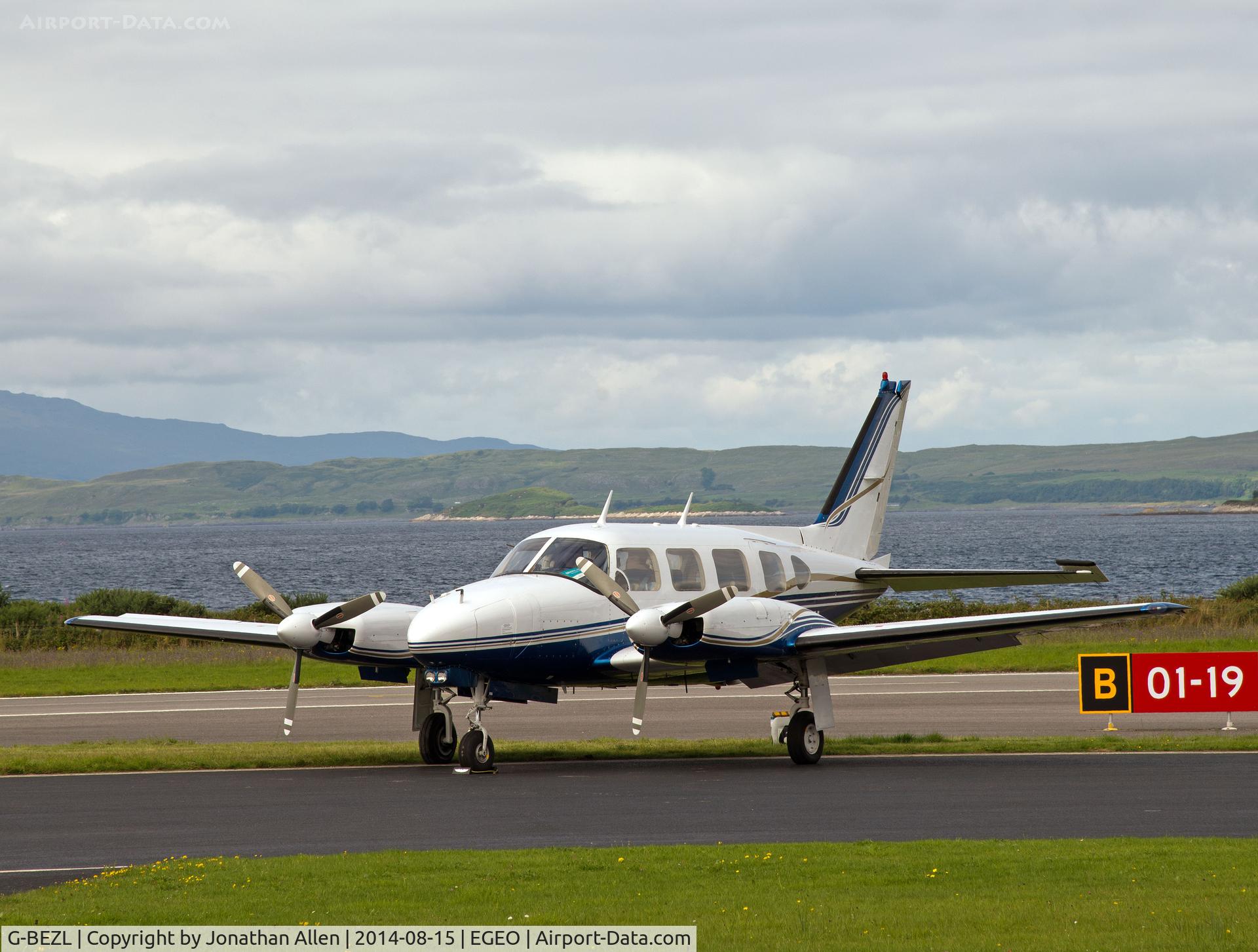 G-BEZL, 1977 Piper PA-31-310 Navajo Navajo C/N 31-7712054, On the ground at Oban Airport.