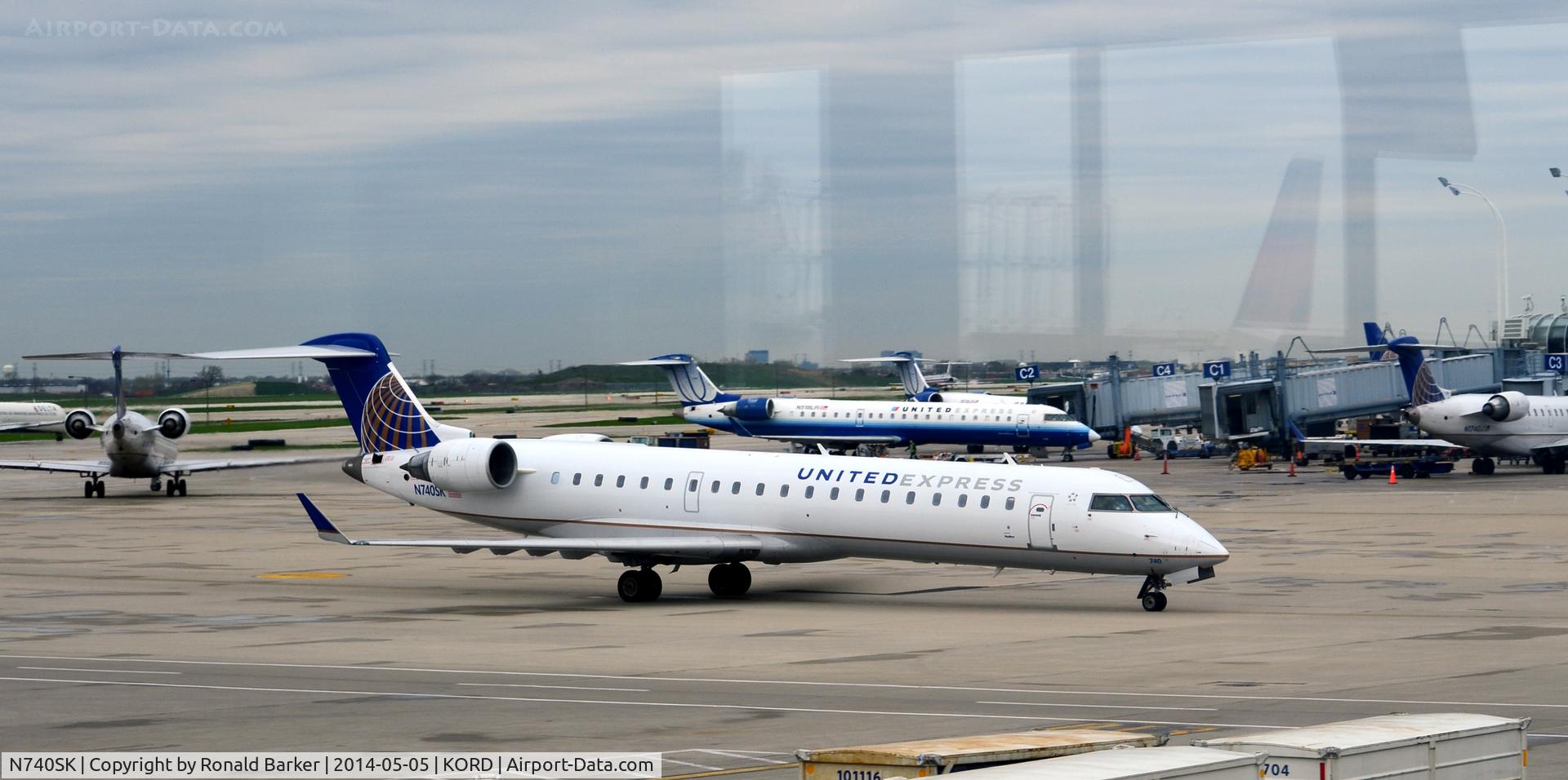 N740SK, 2005 Bombardier CRJ-701 (CL-600-2C10) Regional Jet C/N 10196, Taxi O'Hare