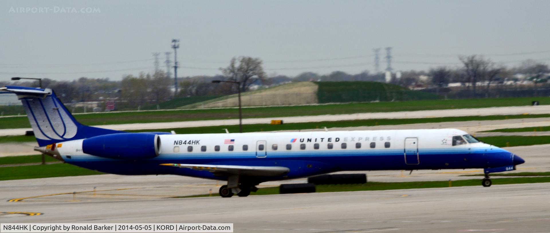 N844HK, 2004 Embraer ERJ-145LR (EMB-145LR) C/N 14500838, Taxi O'Hare