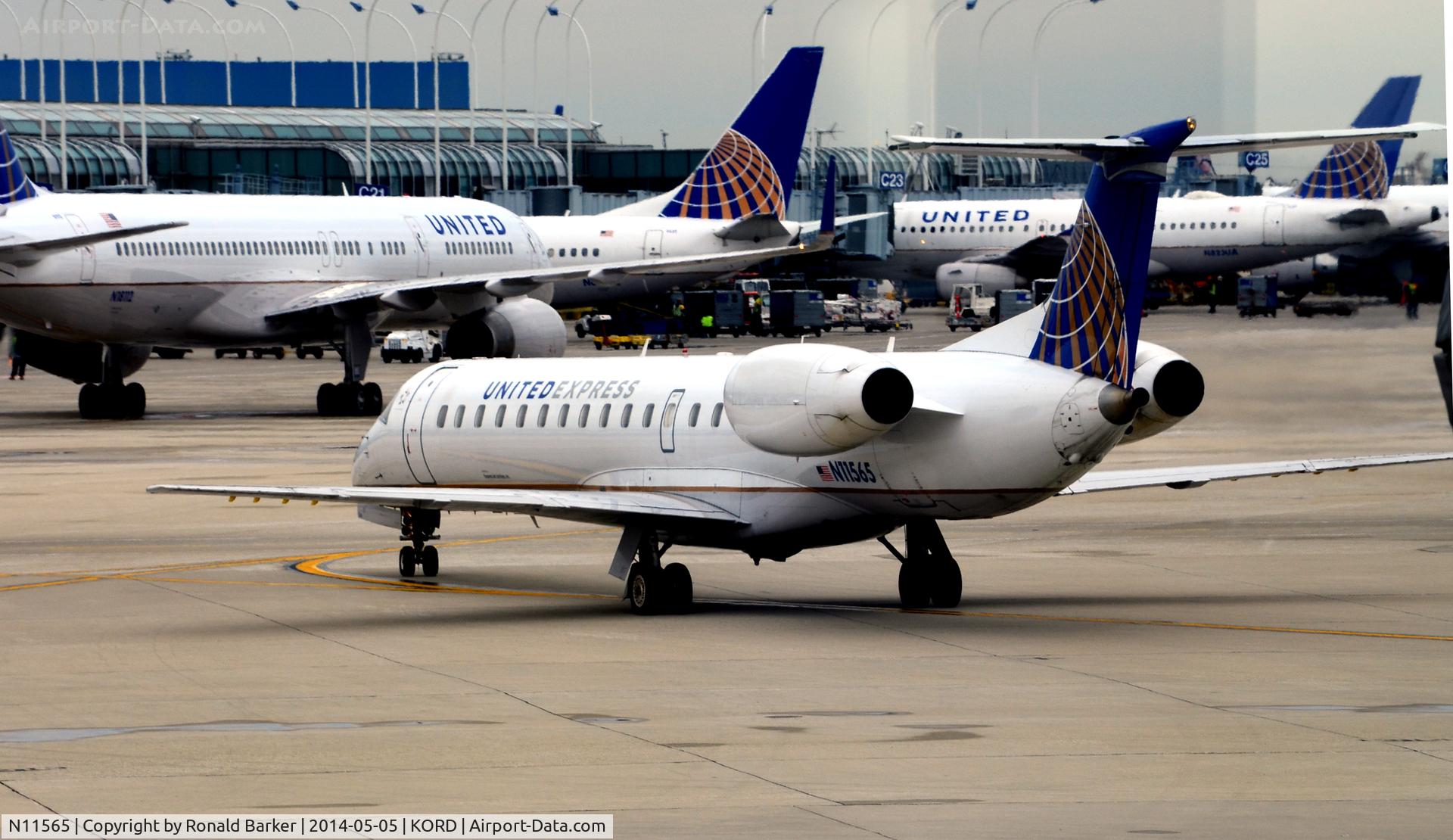 N11565, 2002 Embraer ERJ-145LR (EMB-145LR) C/N 145621, Taxi O'Hare