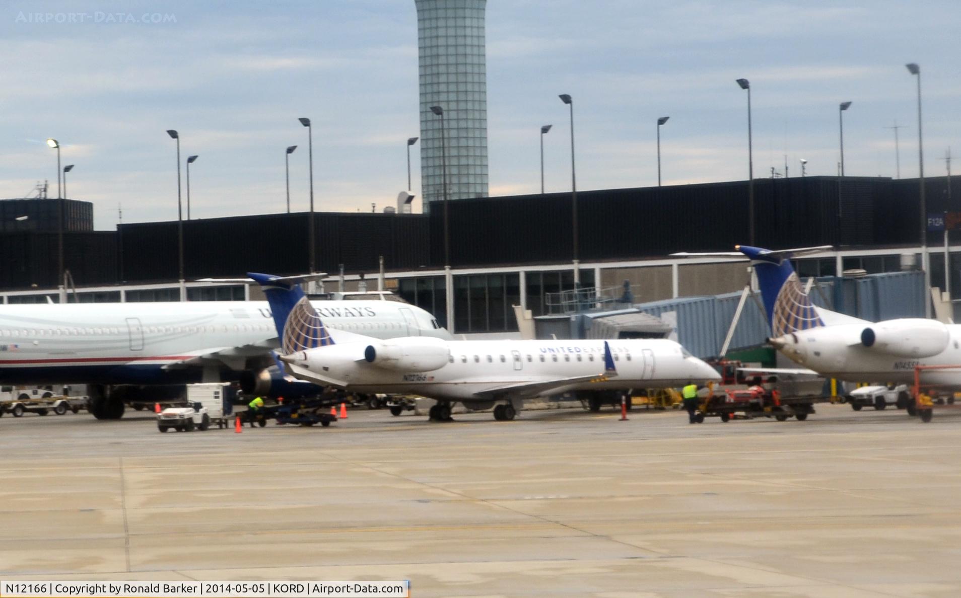 N12166, 2004 Embraer ERJ-145XR (EMB-145XR) C/N 14500831, Gate O'Hare