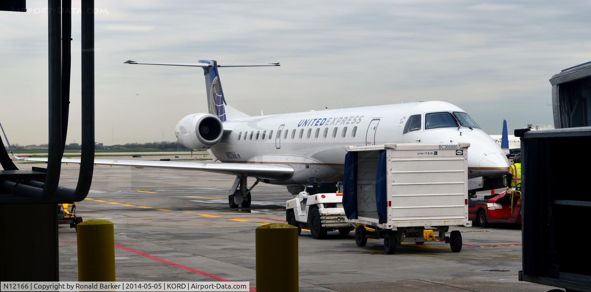 N12166, 2004 Embraer ERJ-145XR (EMB-145XR) C/N 14500831, At the gate O'Hare