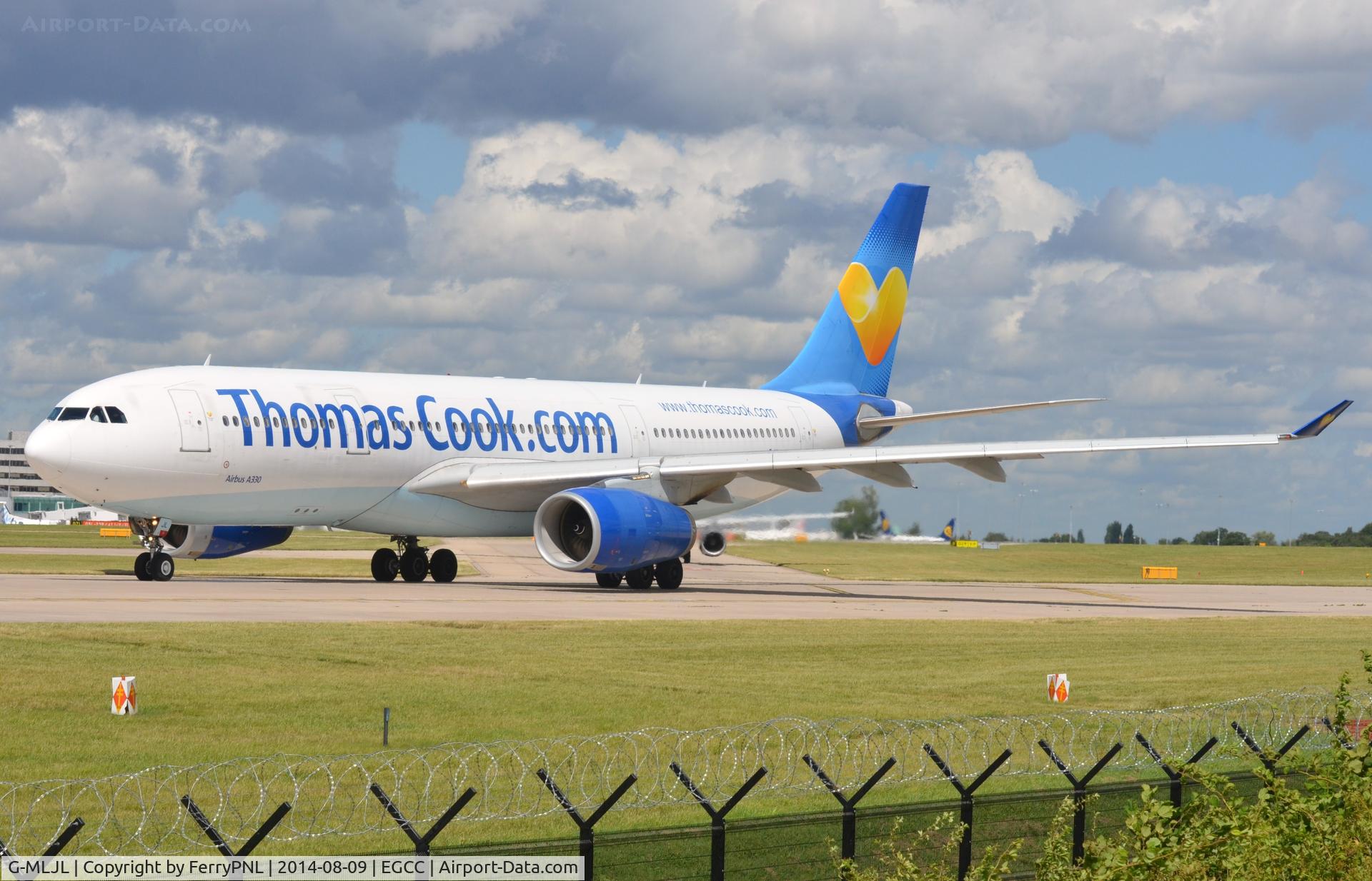 G-MLJL, 1999 Airbus A330-243 C/N 254, Thomas Cook A332 lining-up in MAN