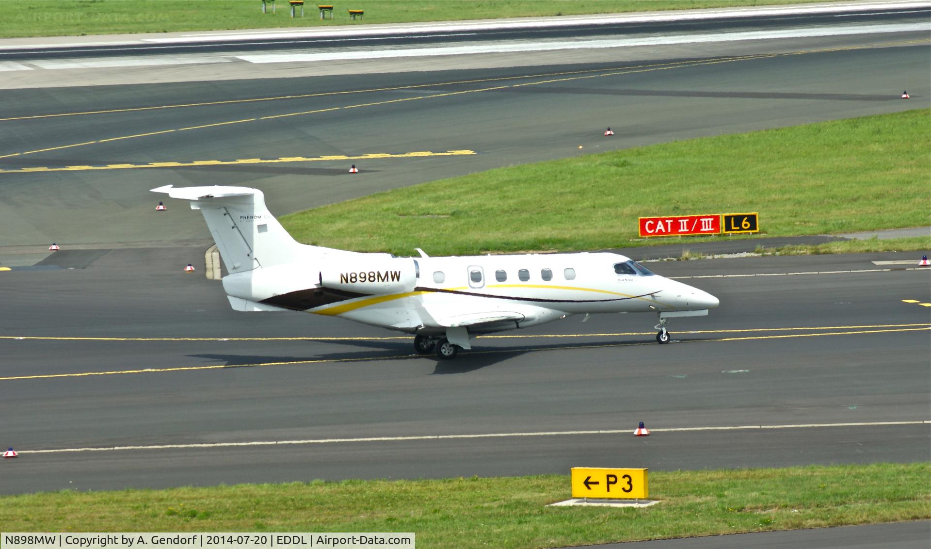N898MW, 2011 Embraer EMB-505 Phenom 300 C/N 50500048, Untitled, seen here taxiing at Düsseldorf Int'l(EDDL)