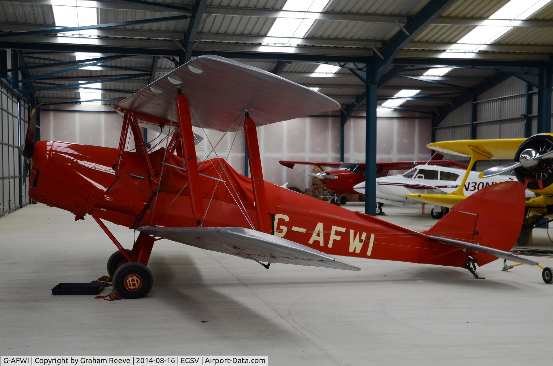 G-AFWI, 1939 De Havilland DH-82A Tiger Moth II C/N 82187, Parked at Old Buckenham.