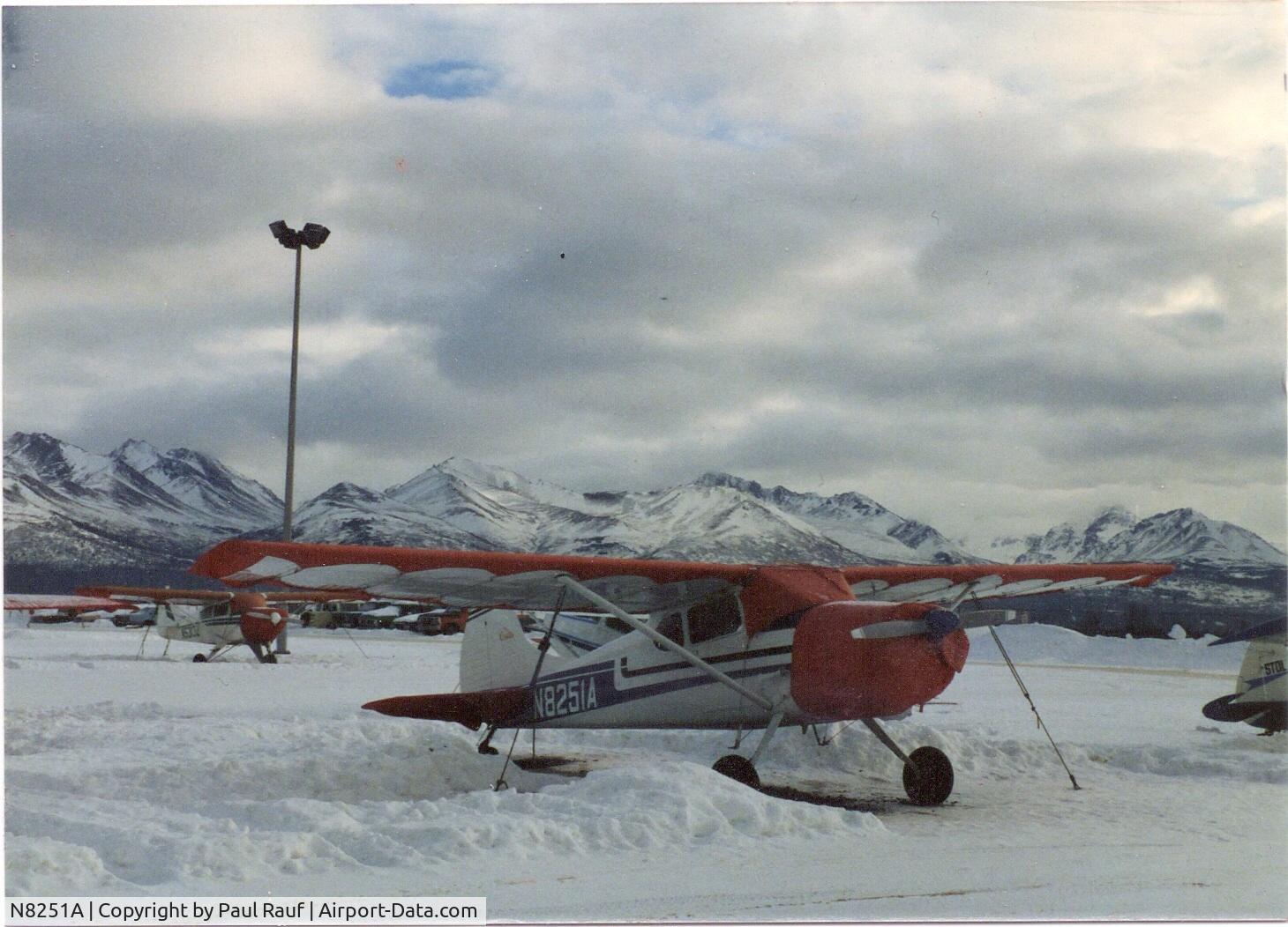 N8251A, 1952 Cessna 170B C/N 25103, Tie down at Merrill airport in Anchorage Alaska in winter. Chugach mountains in background.  1987 timeframe.