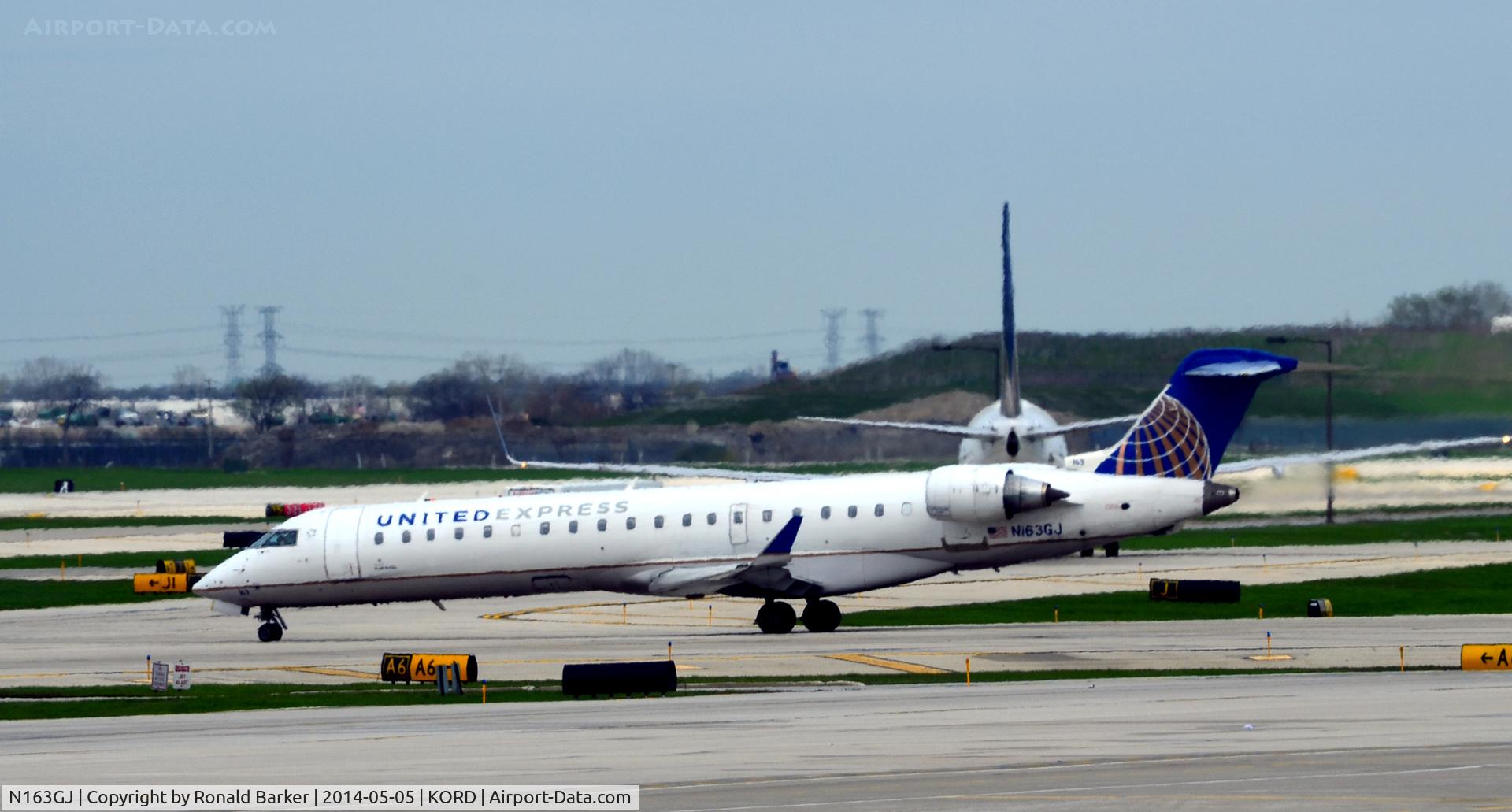 N163GJ, 2006 Bombardier CRJ-702 (CL-600-2C10) Regional Jet C/N 10255, Taxi O'Hare