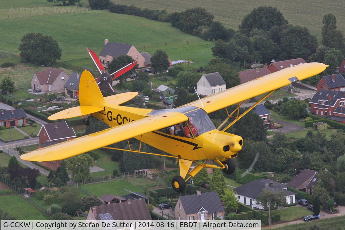 G-CCKW, 1954 Piper L-21B Super Cub (PA-18-135) C/N 18-3535, Overflying Schaffen's windmill. Picture taken from Piper Cub G-NETY.