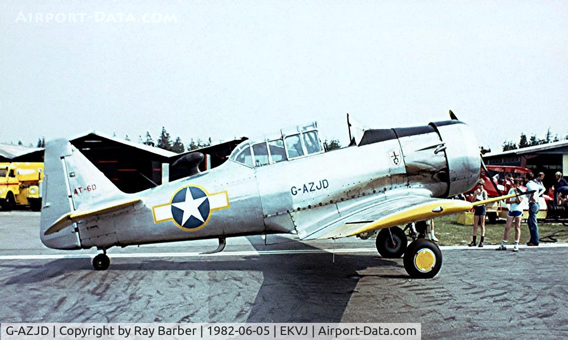 G-AZJD, 1943 North American AT-6D Harvard III C/N 88-14948 (41-33931), North American AT-6D Harvard III [88-14948] Stauning~OY 05/06/1982. From a slide.