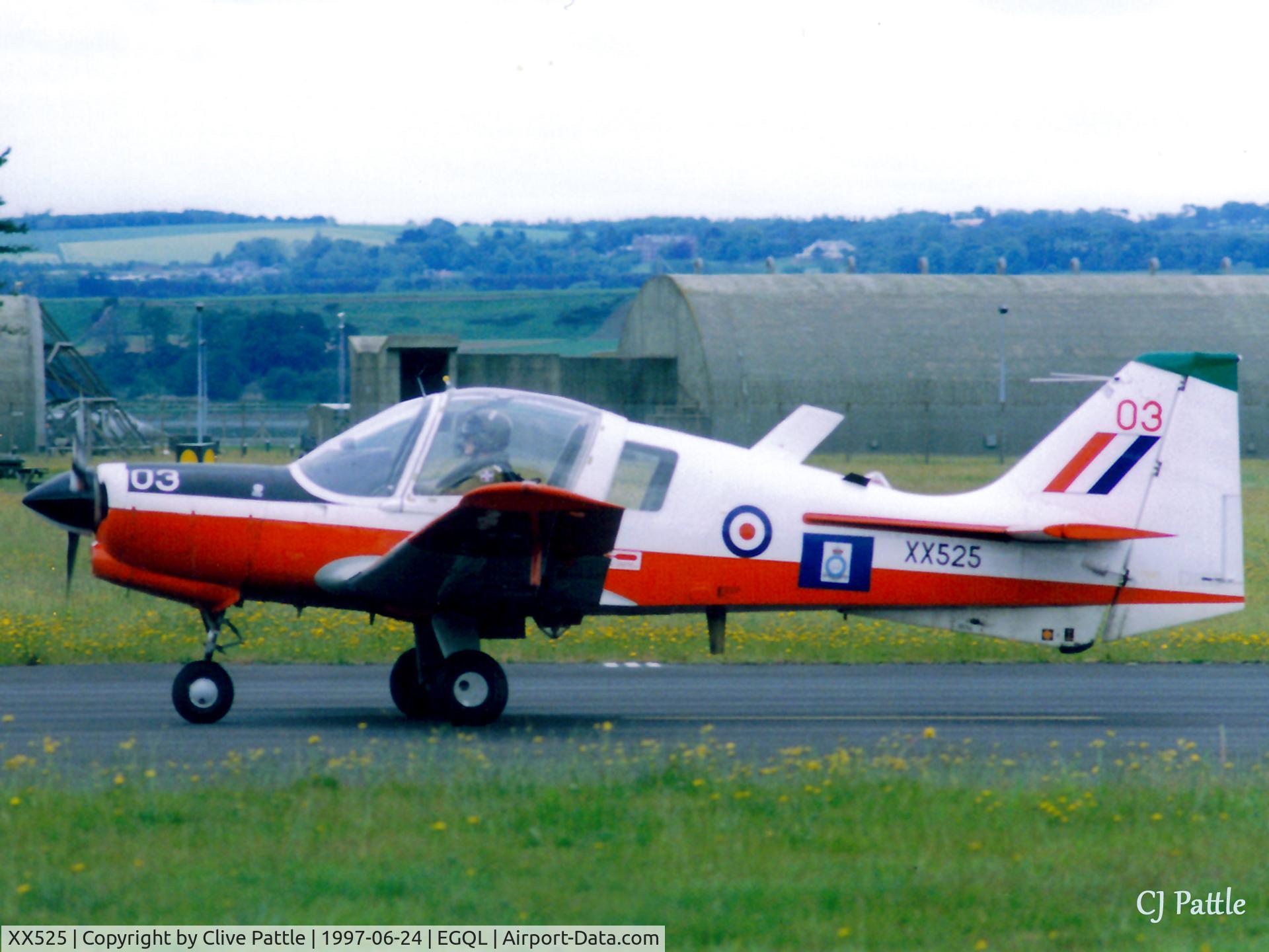 XX525, 1973 Scottish Aviation Bulldog T.1 C/N BH120/211, Scanned from print. Bulldog T.1 XX525 coded '03' of the resident Edinburgh, Dundee and St Andrews UAS taxies out to Rwy 27 at RAF Leuchars, June 1997. Later sold as G-CBJJ.