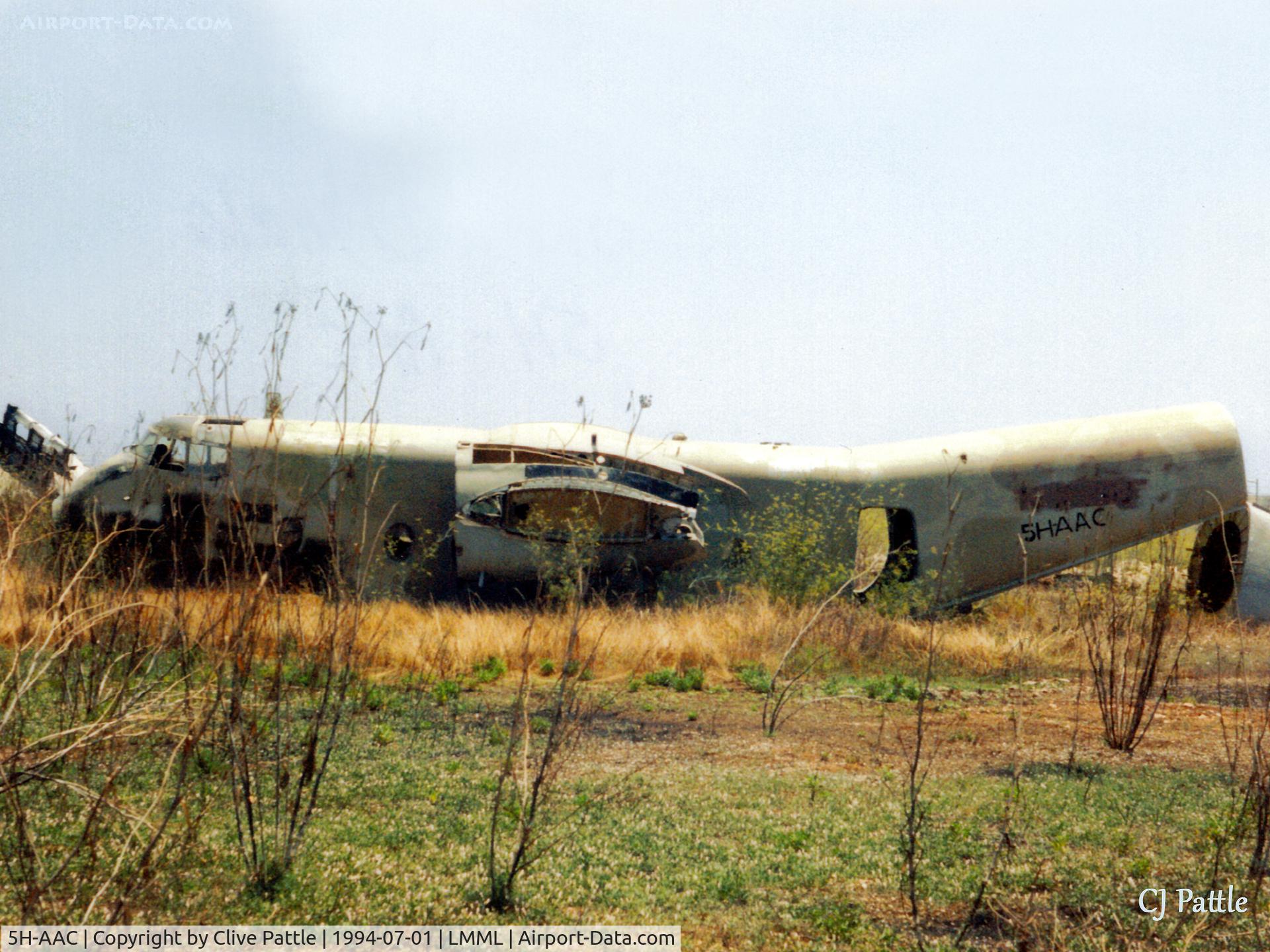 5H-AAC, 1958 De Havilland Canada DHC-4 Caribou C/N 011, Scanned from print. Remains of Caribou 5H-AAC at the International Fire Training Centre at Hal Far (disused). A/c is c/n 011 f/f 14-10-60 ex Tanzanian AF JW9014.