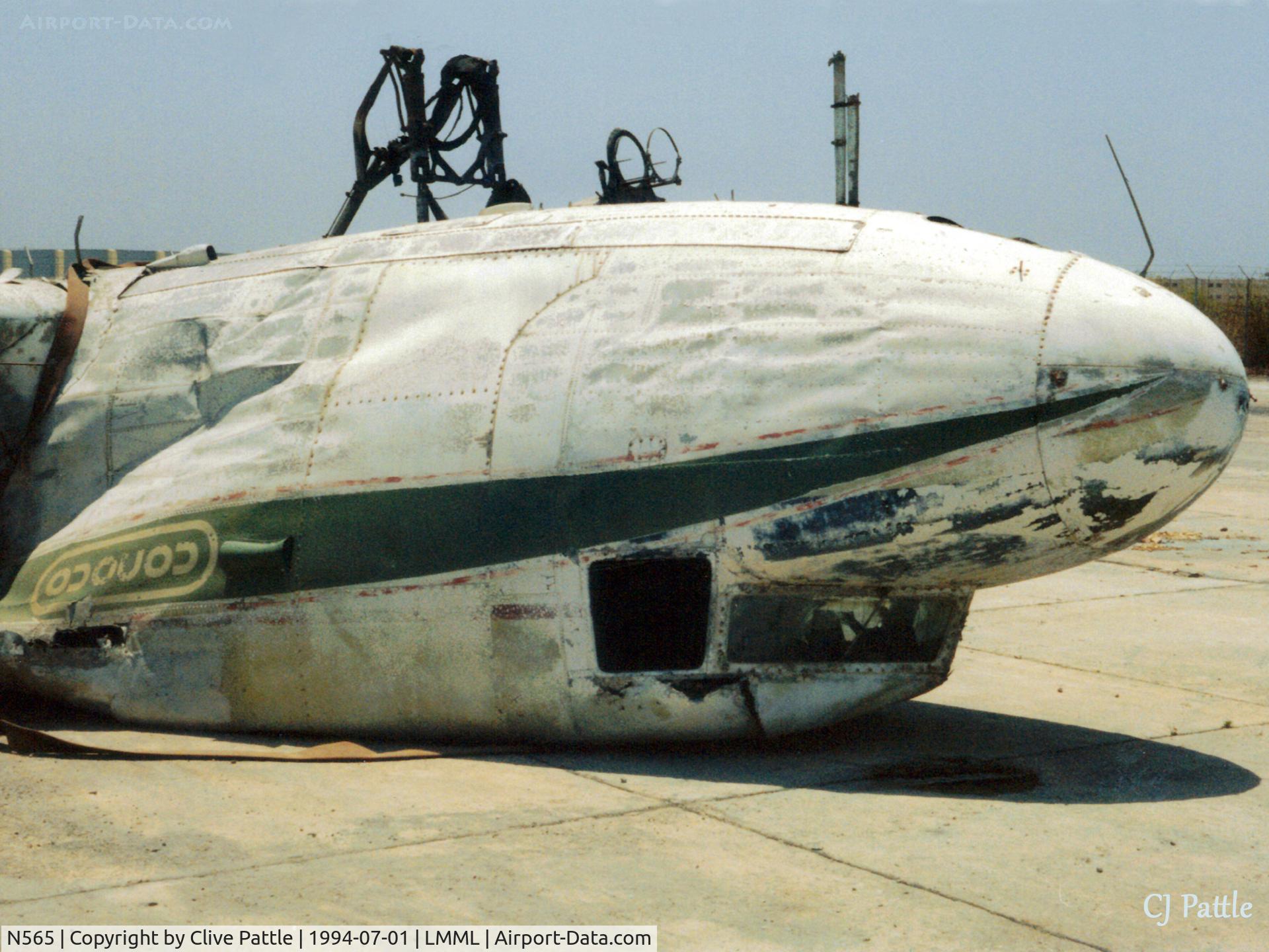N565, 1944 Douglas C-47B-10-DK (DC-3C) C/N 26400, Scanned from print - remains of ex Conaco Dakota N565 at the International Fire Training Centre at Hal Far, Malta. LMML used for ref/search purposes only