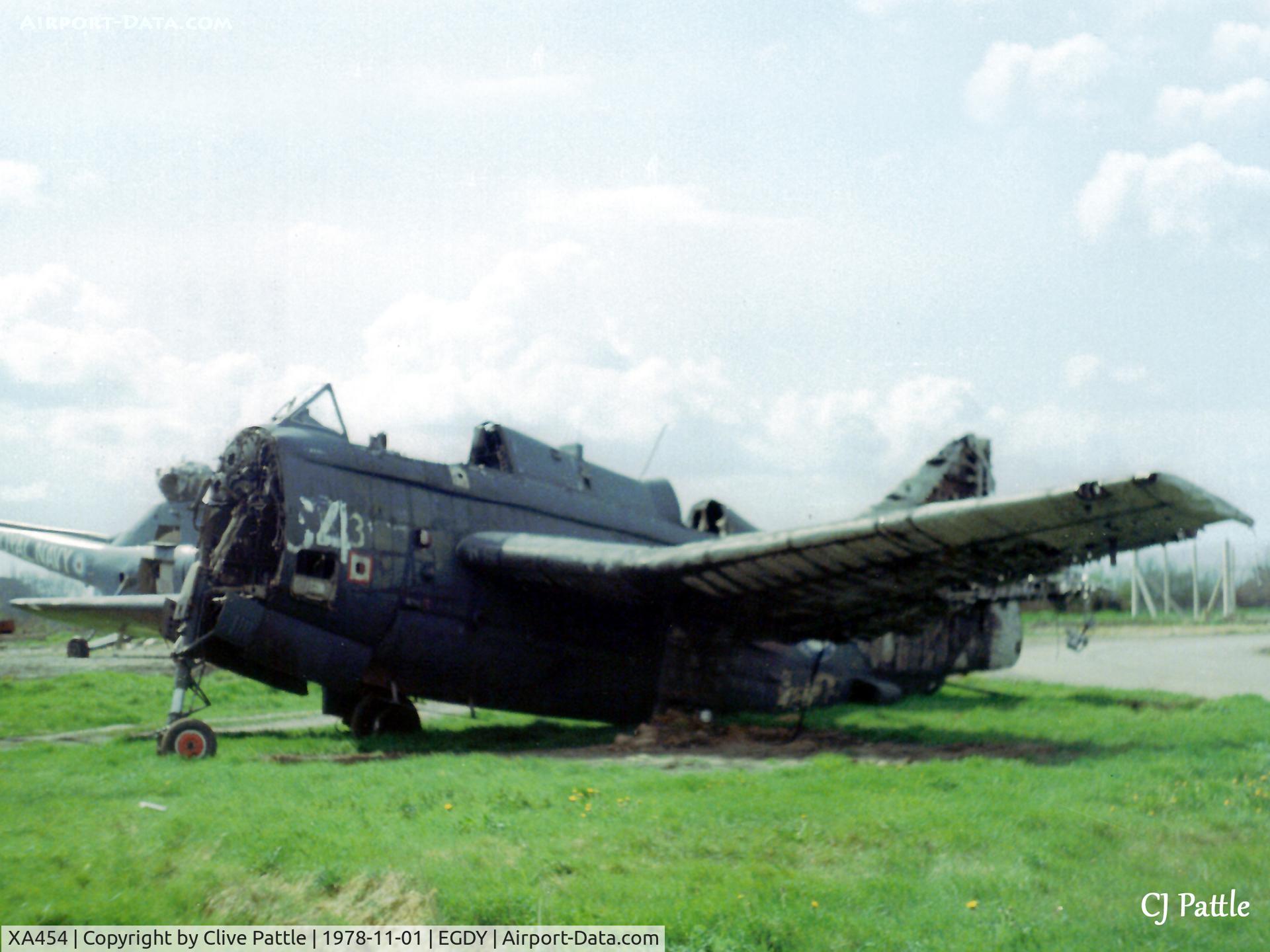 XA454, Fairey Gannet COD.4 C/N F9307, Scanned from print. FAAM reject, Fairey Gannet COD.4 XA454 ex coded 264/H on the fire dump at RNAS Yeovilton in November 1978. Dragonfly behind is WG718 (see photo)