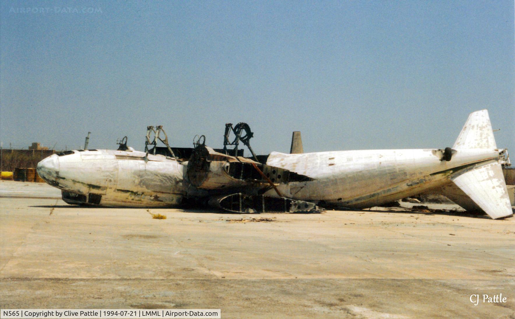 N565, 1944 Douglas C-47B-10-DK (DC-3C) C/N 26400, Scanned from print - another view of Dakota N565 ex Conaco at the International Fire Training Centre at Hal Far (disused), Malta. ICAO LMML used for ref/search purposes only.