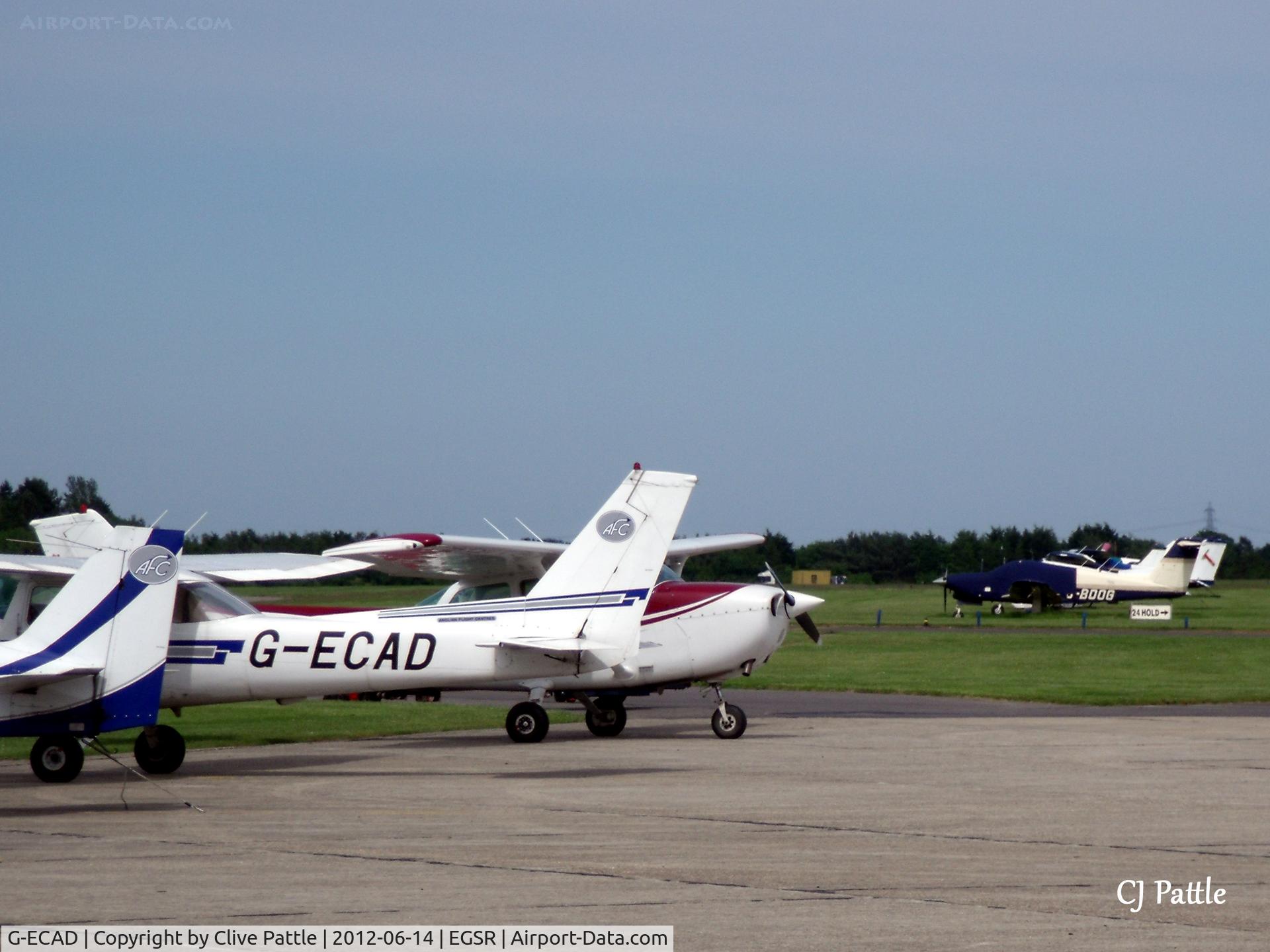 G-ECAD, 1980 Reims FA152 Aerobat C/N 0369, Busy GA park at Earl's Colne viewed from the Cafe.