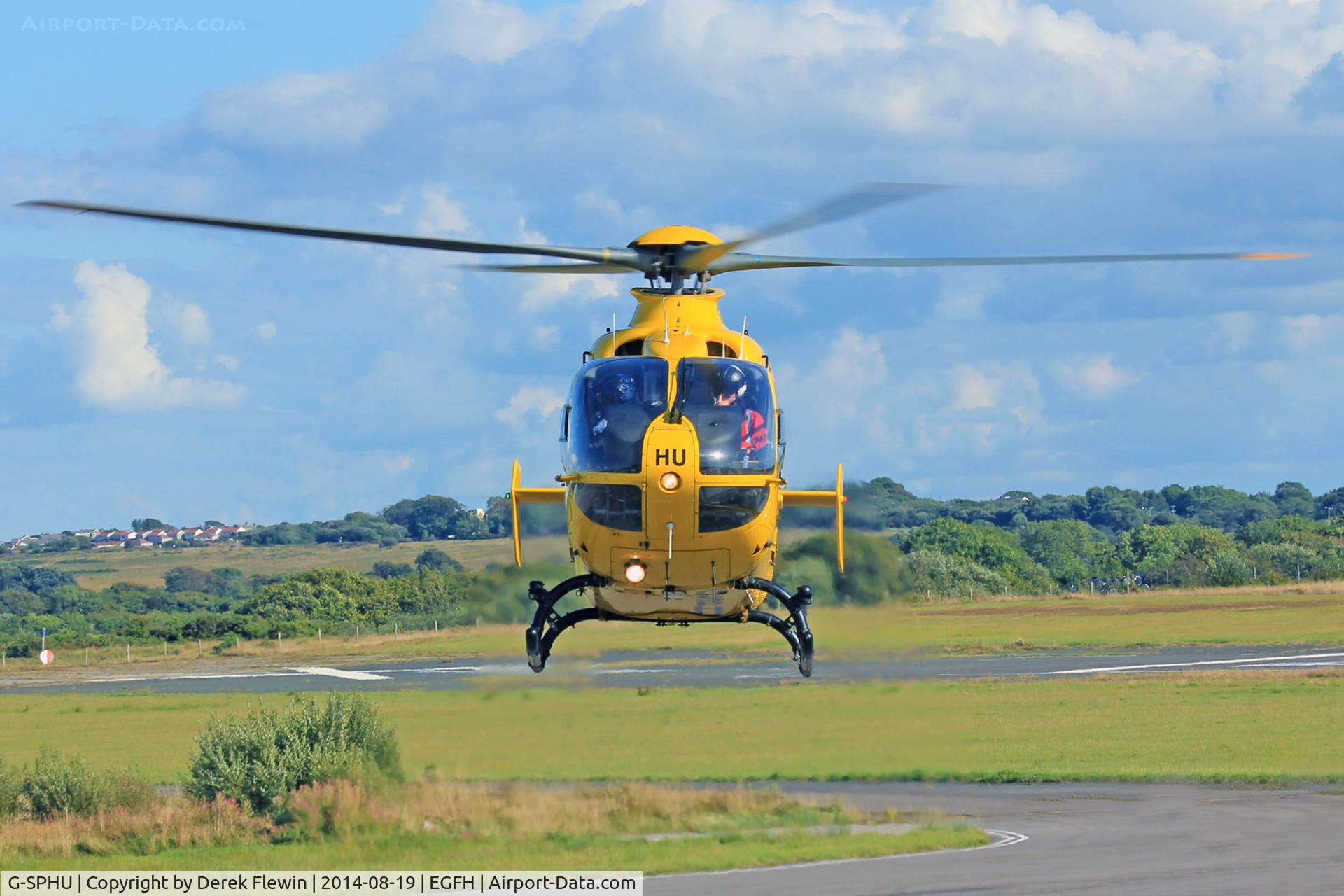 G-SPHU, 2002 Eurocopter EC-135T-2 C/N 0245, Bonds spare frame, Eurocopter EC-135T-2, seen lifting from the pumps at EGFH.
