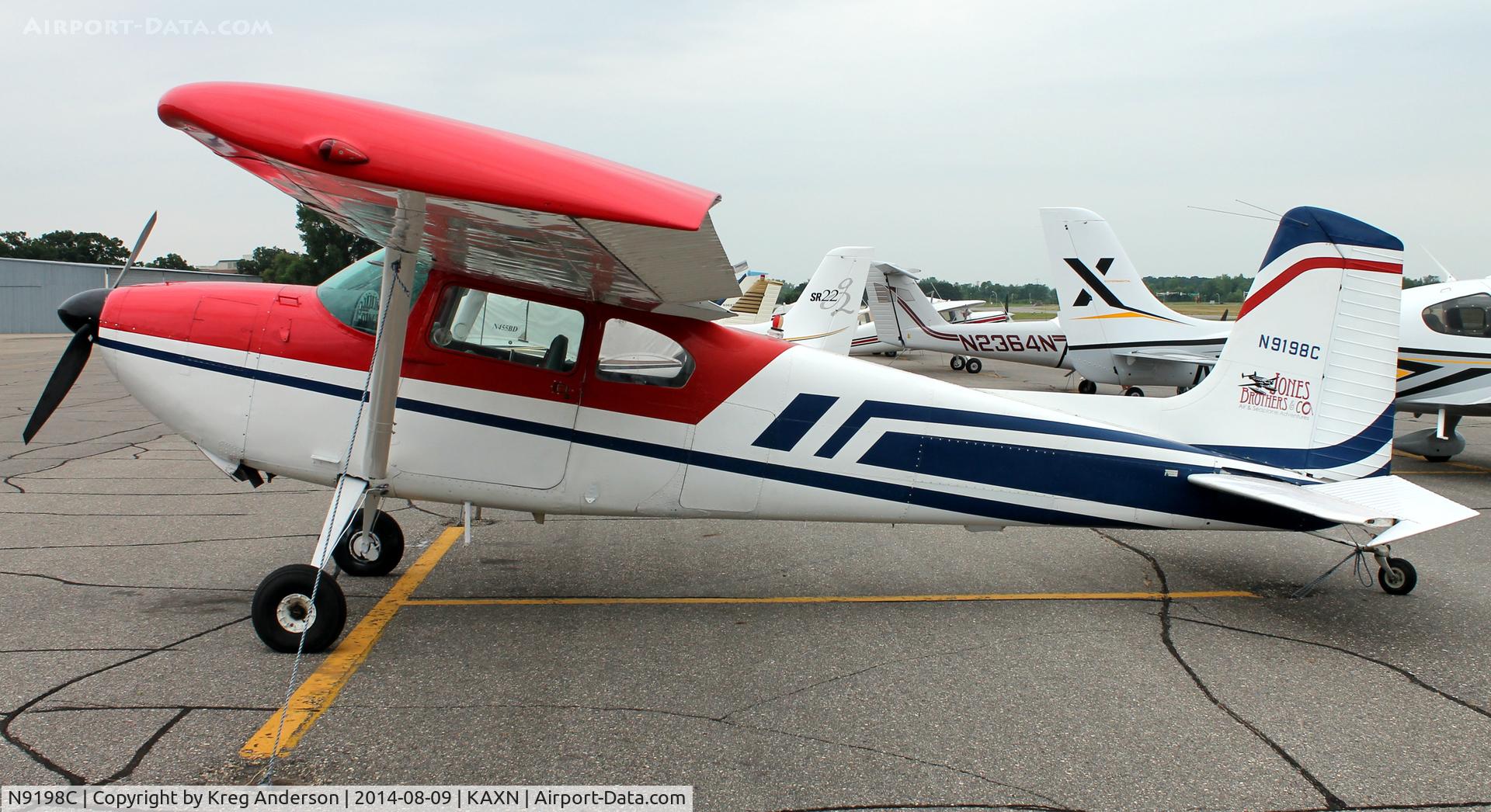 N9198C, 1954 Cessna 180 C/N 31297, Cessna 180 Skywagon on the line.