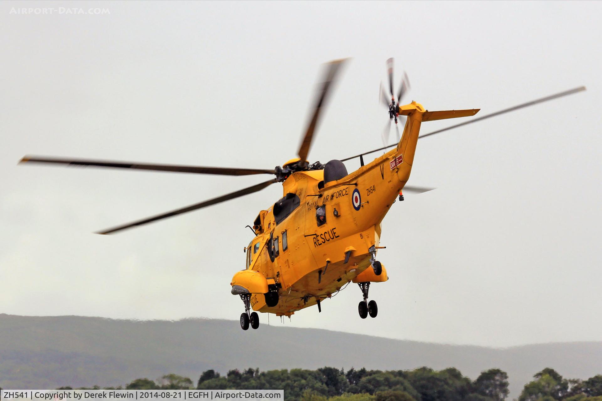 ZH541, Westland Sea King HAR.3A C/N WA1007, Chivoner based, Sea King HAR.3A, Rescue 169, seen lifting at EGFH, note the ALM checking the rear through the port blister window