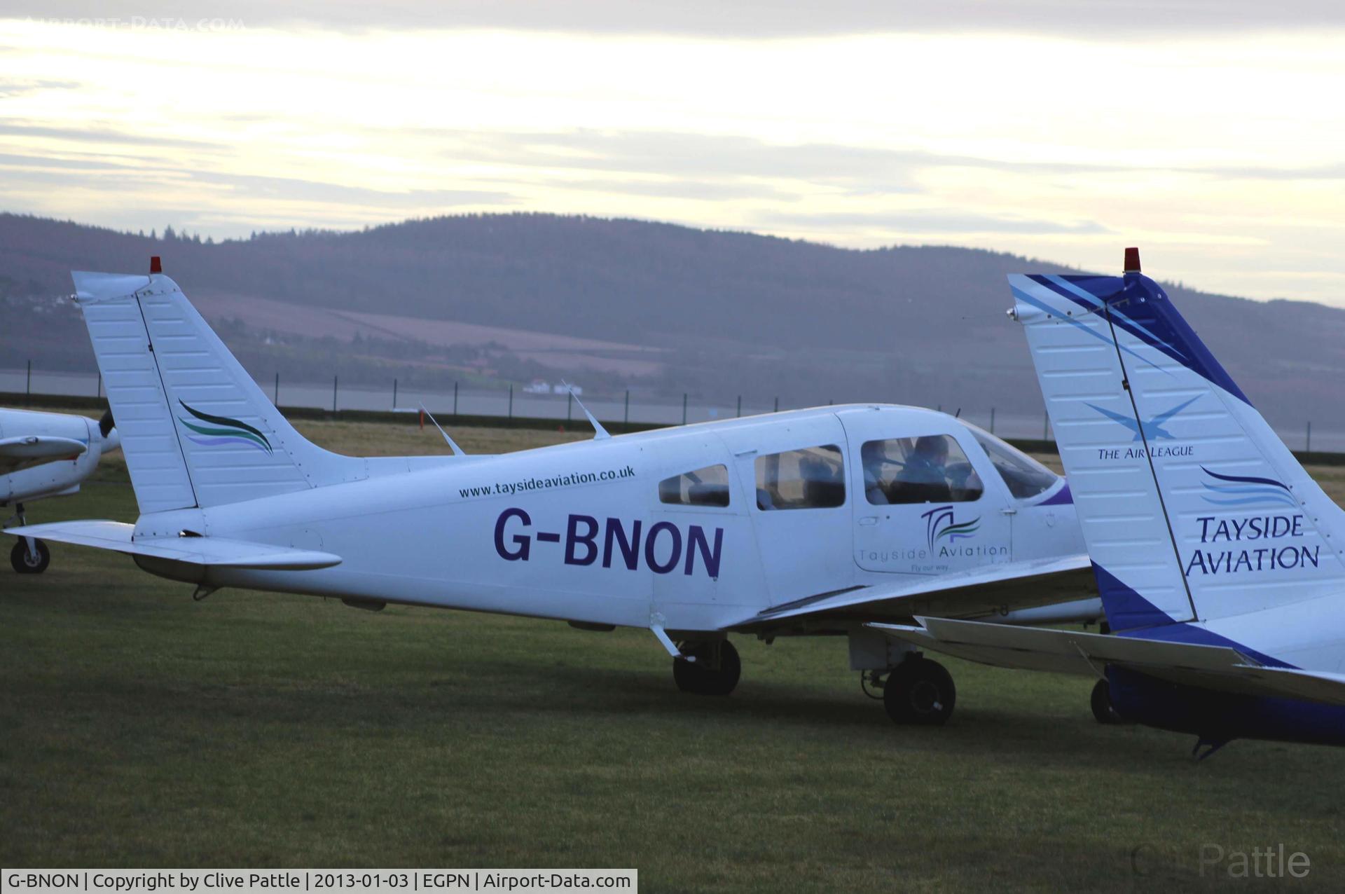 G-BNON, 1987 Piper PA-28-161 Cherokee Warrior II C/N 2816025, Sunset departure at Dundee